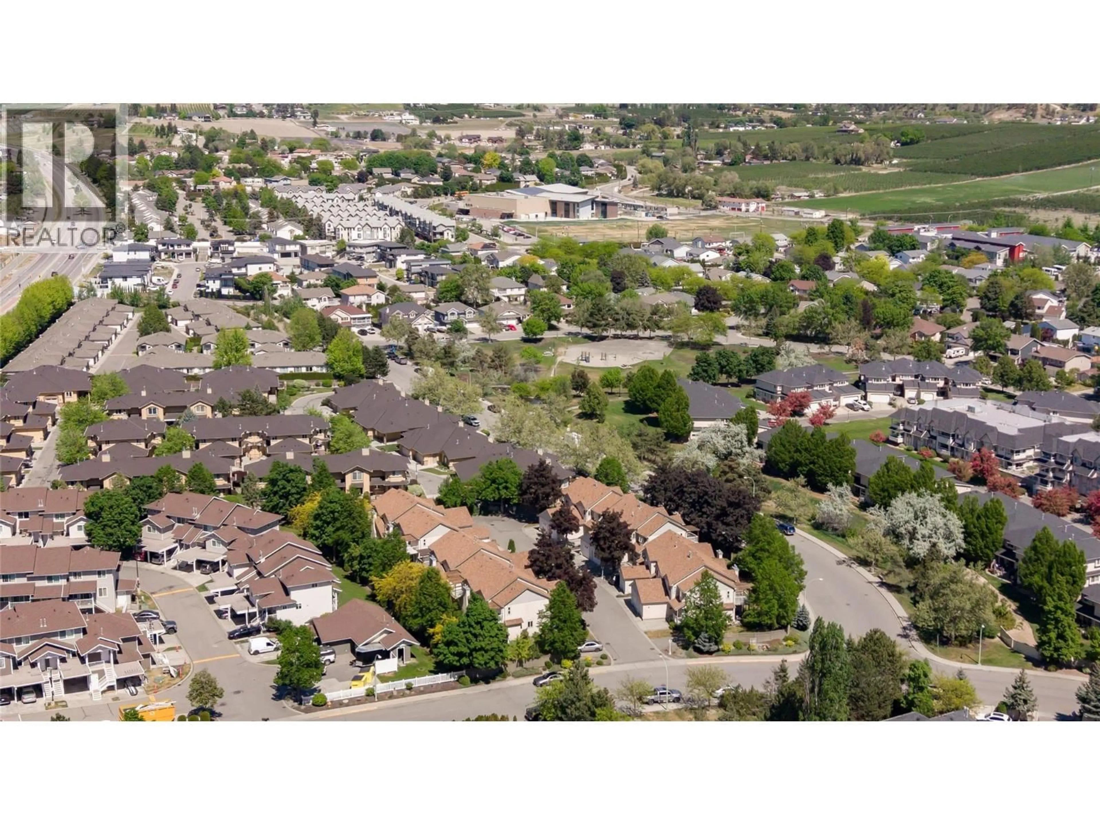 A pic from outside/outdoor area/front of a property/back of a property/a pic from drone, street for 106 - 321 WHITMAN ROAD, Kelowna British Columbia V1V1Y6