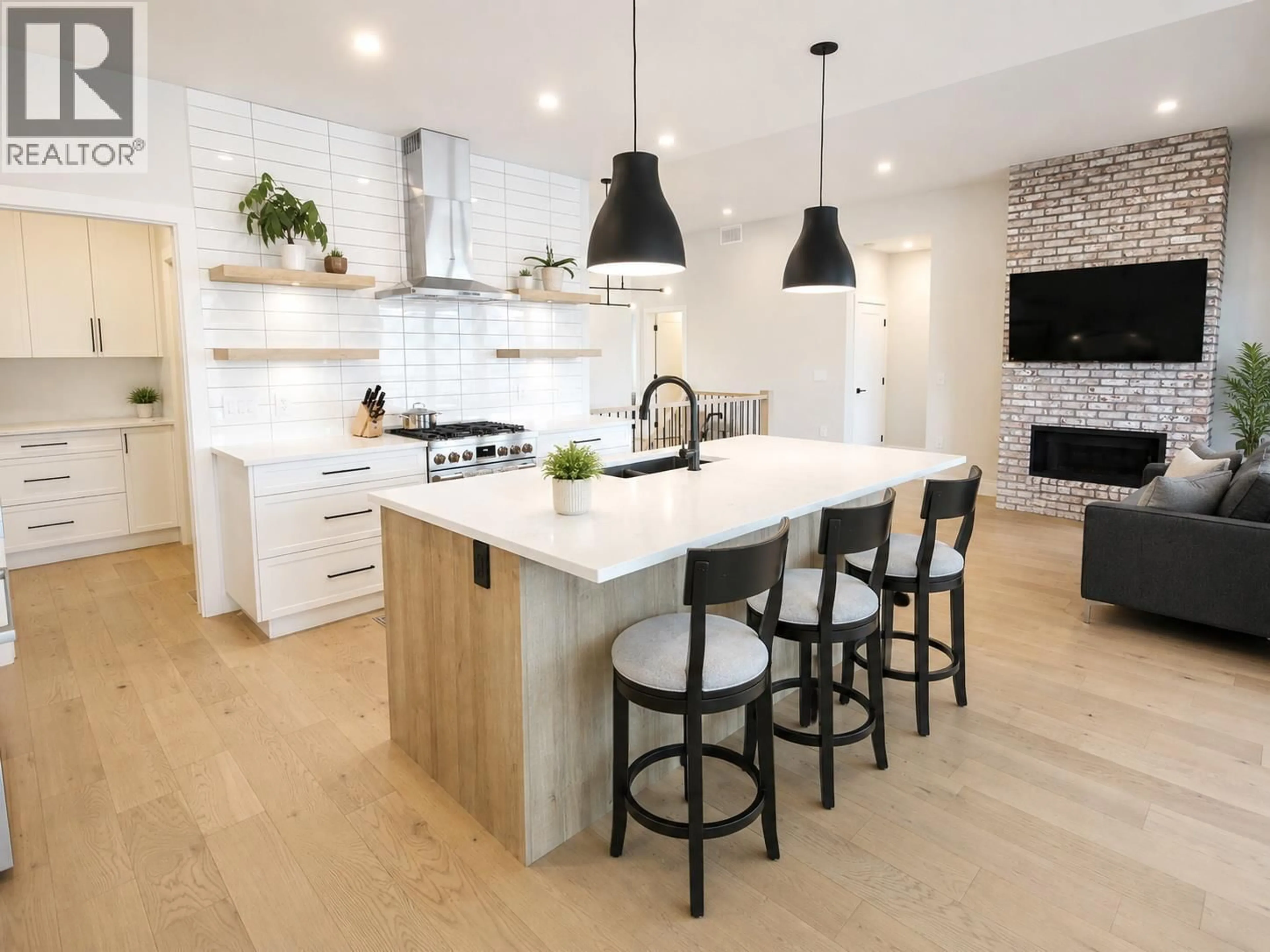 Contemporary kitchen, wood/laminate floor for 1164 ELK STREET, Penticton British Columbia V2A2S6