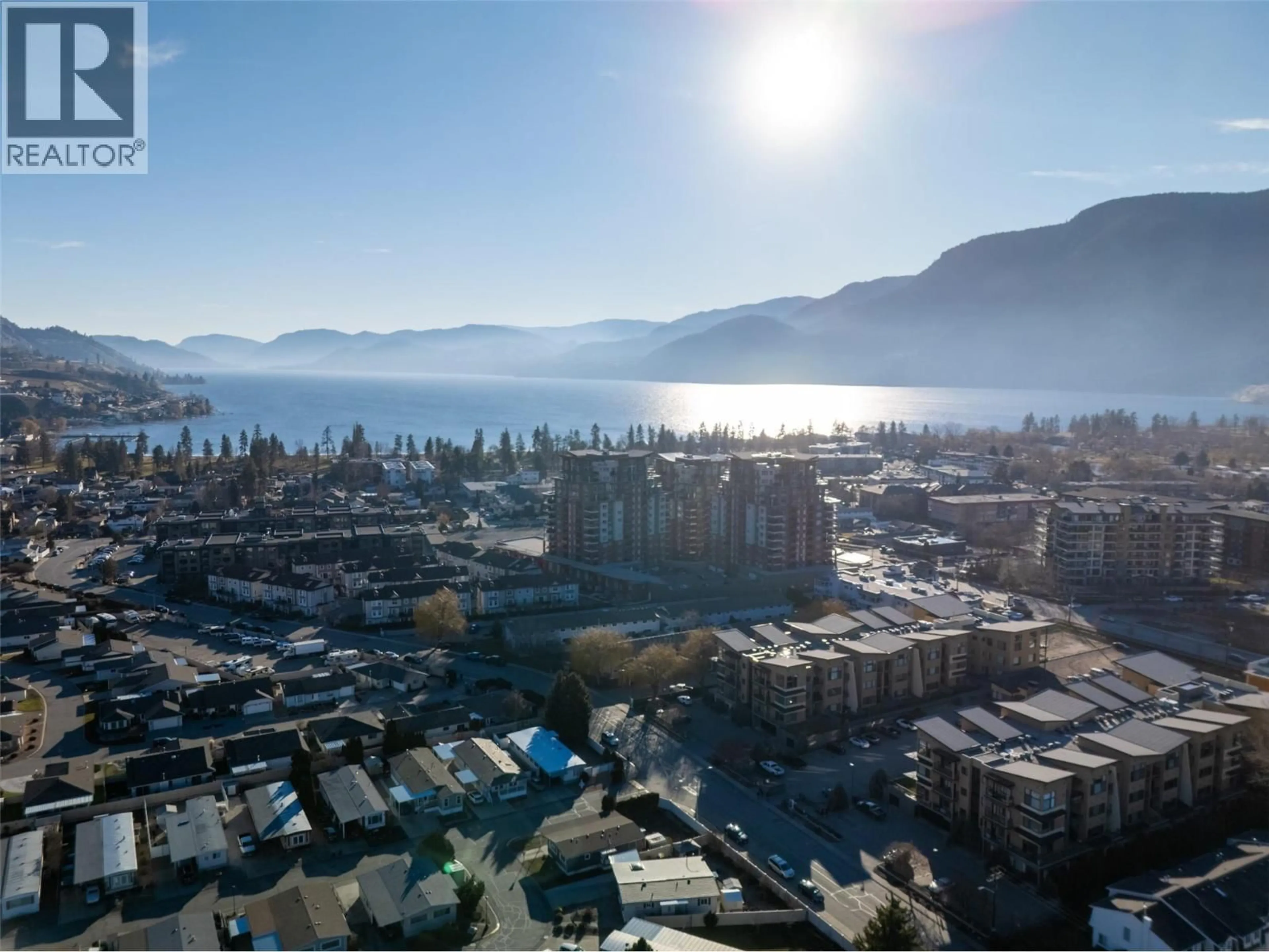 A pic from outside/outdoor area/front of a property/back of a property/a pic from drone, mountain view for 404 - 3313 WILSON STREET, Penticton British Columbia V2A8J3