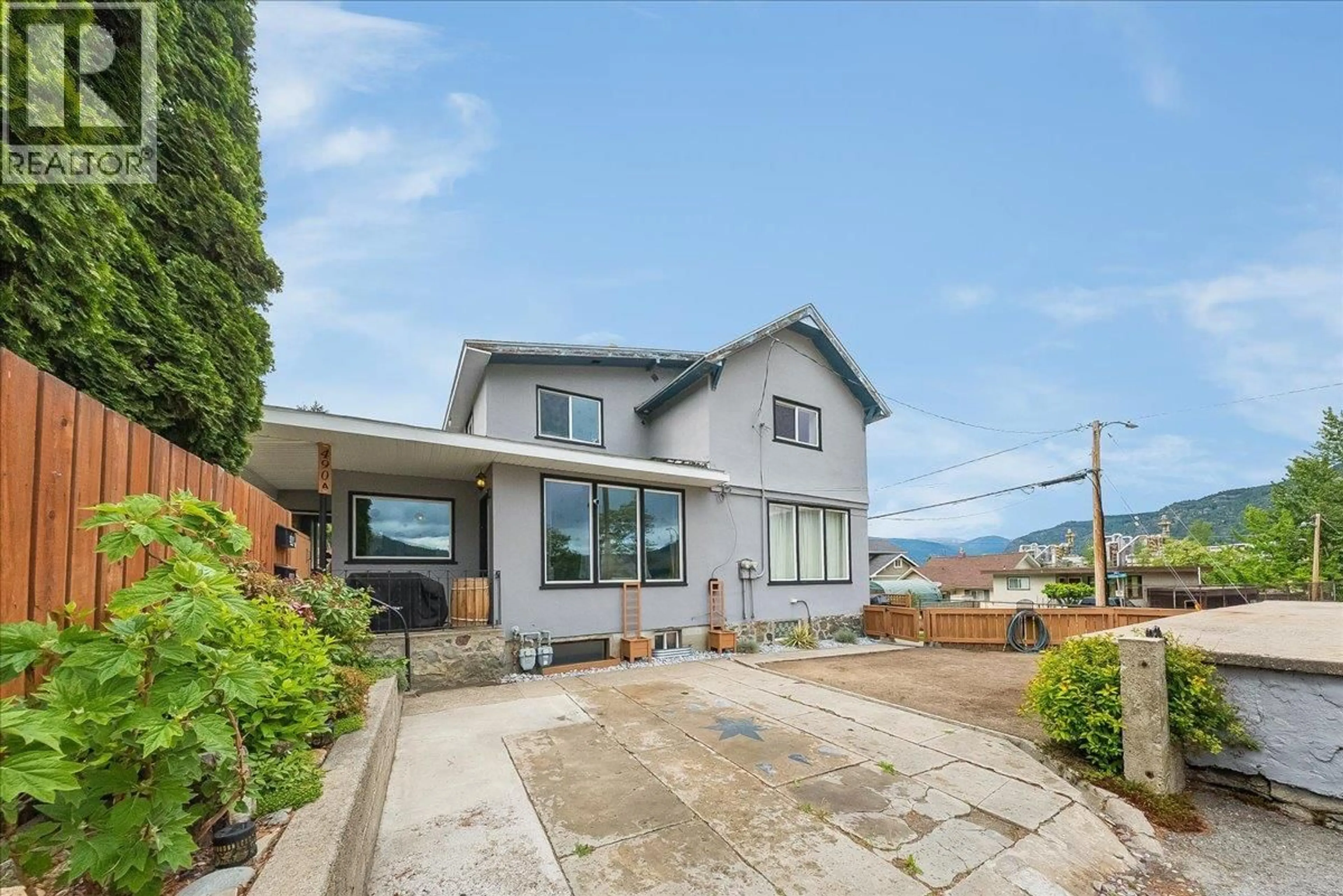 A pic from outside/outdoor area/front of a property/back of a property/a pic from drone, street for 490 AUSTAD LANE, Trail British Columbia V1R3K6