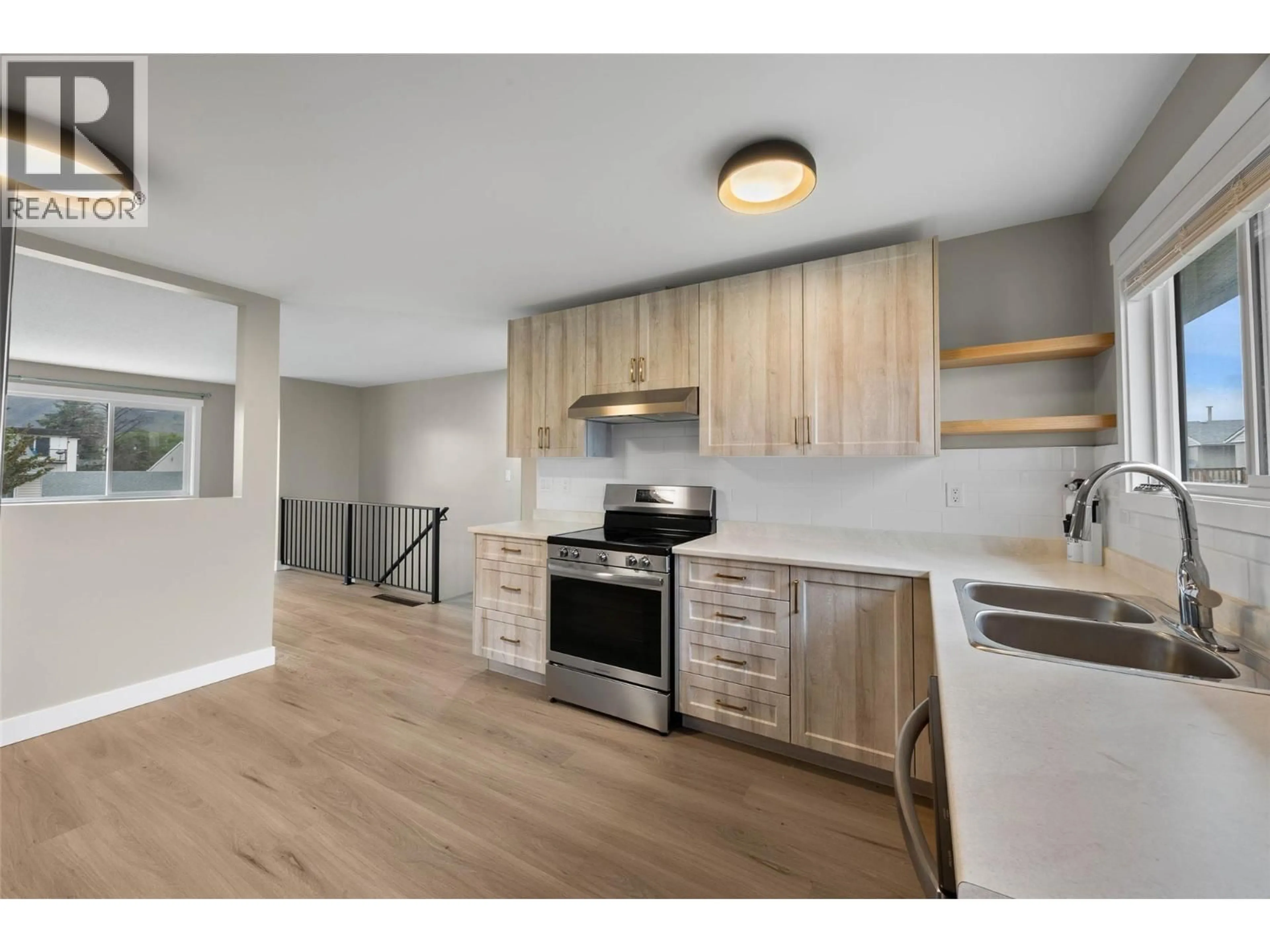 Open concept kitchen, wood/laminate floor for 17 - 800 VALHALLA DRIVE, Kamloops British Columbia V2B1R8