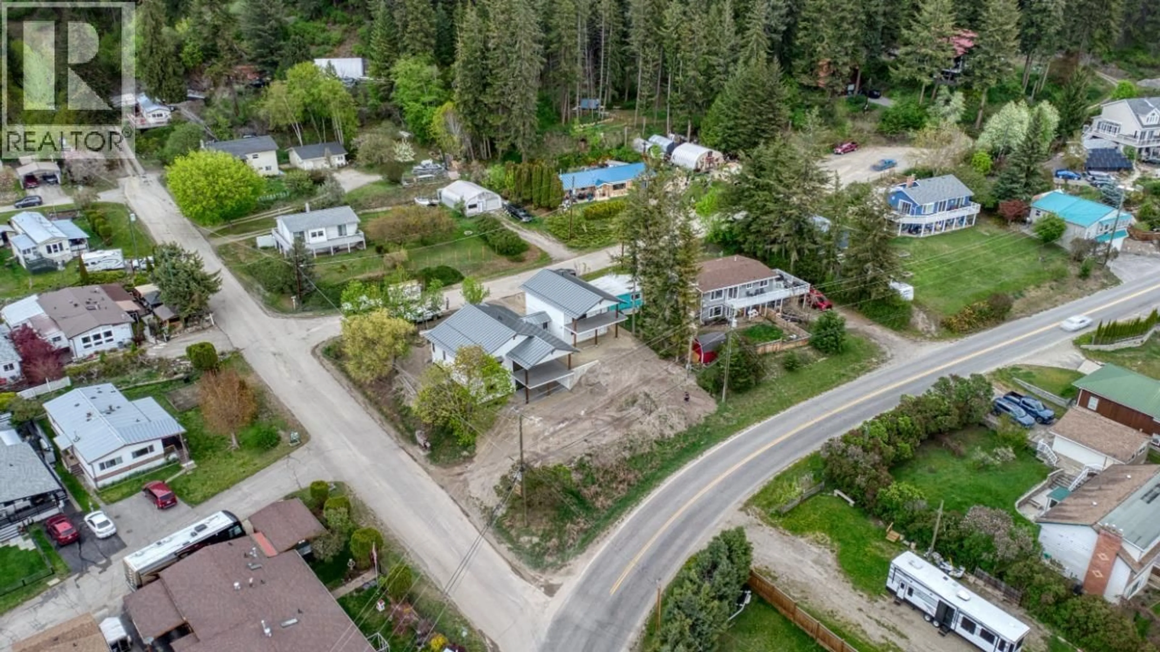 A pic from outside/outdoor area/front of a property/back of a property/a pic from drone, street for 3970 RICHARDSON ROAD, Tappen British Columbia V0E2X1