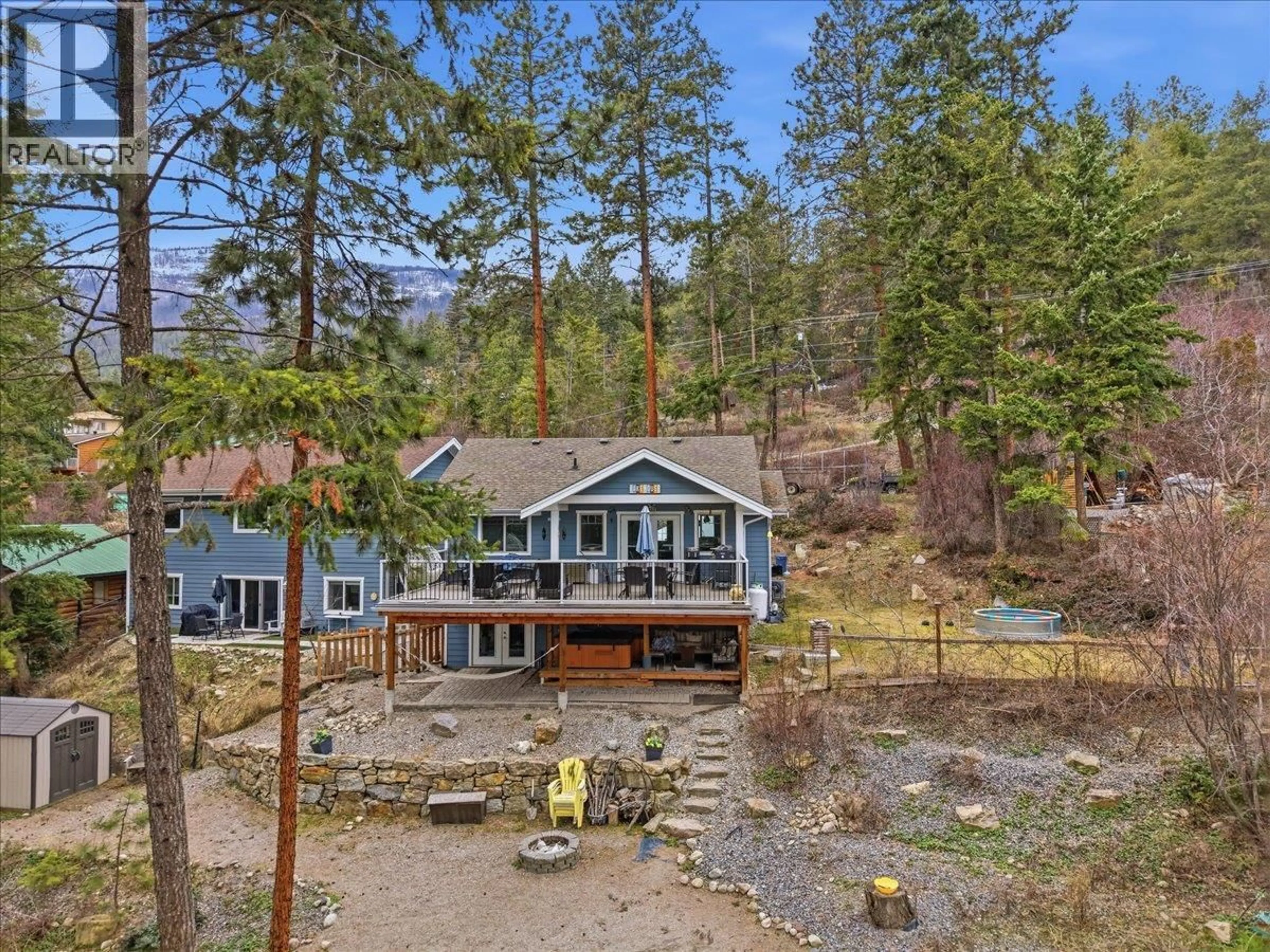 A pic from outside/outdoor area/front of a property/back of a property/a pic from drone, water/lake/river/ocean view for 309 KILLARNEY WAY, Vernon British Columbia V1H2C5