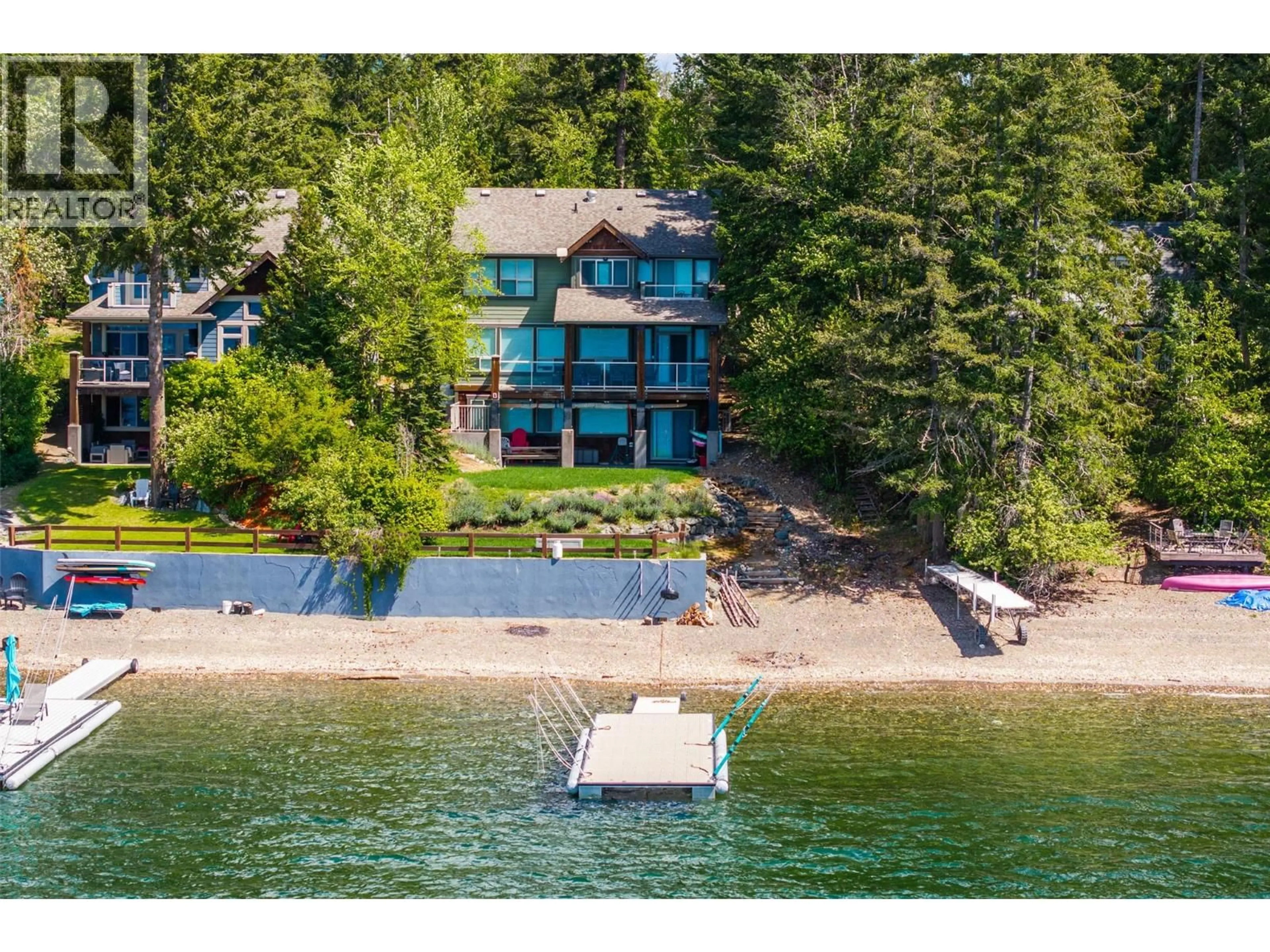 A pic from outside/outdoor area/front of a property/back of a property/a pic from drone, water/lake/river/ocean view for 6058 DAVIS ROAD, Magna Bay British Columbia V0E1L0