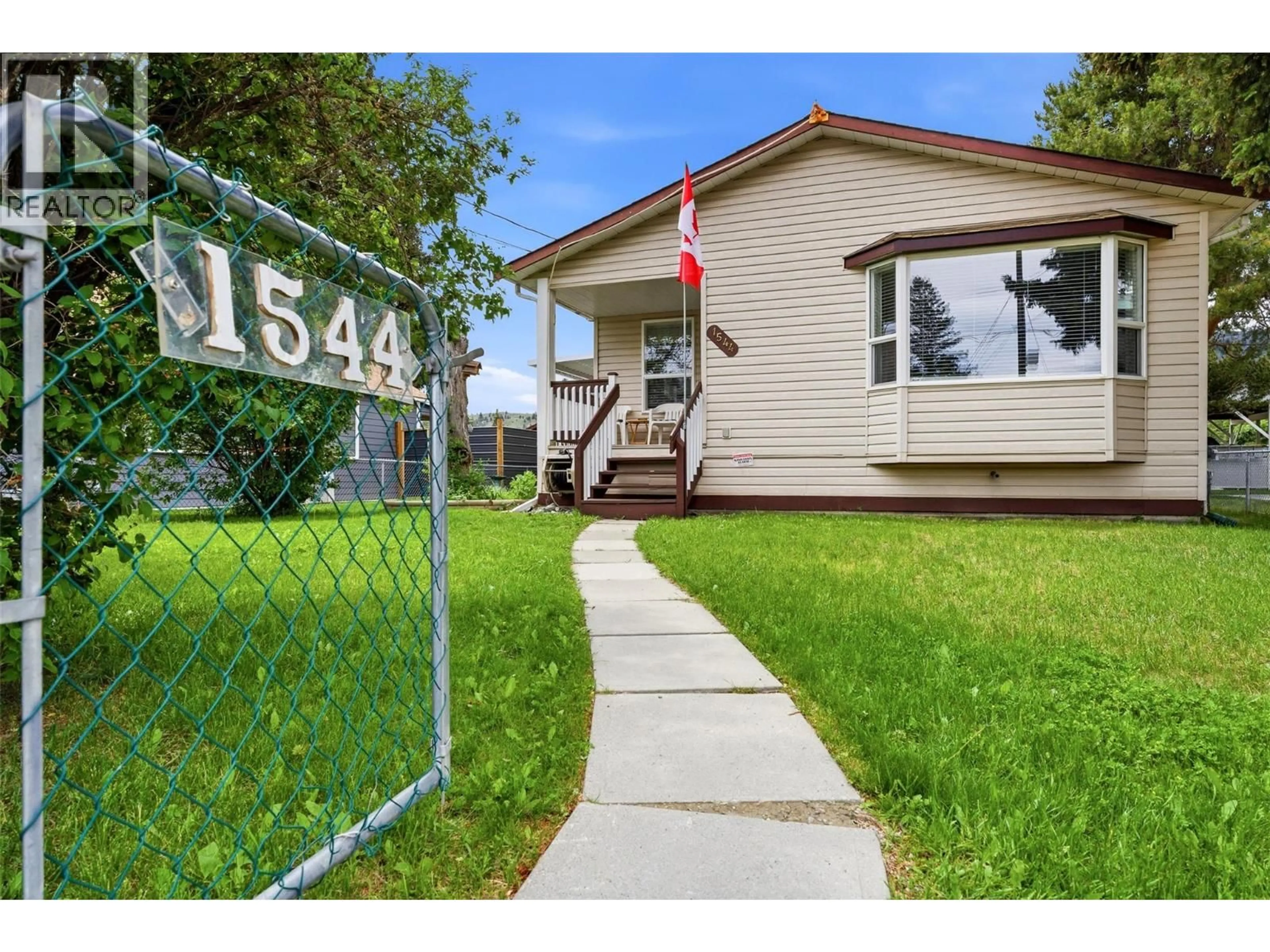 Home with vinyl exterior material, street for 1544 CANFORD AVENUE, Merritt British Columbia V1K1B8