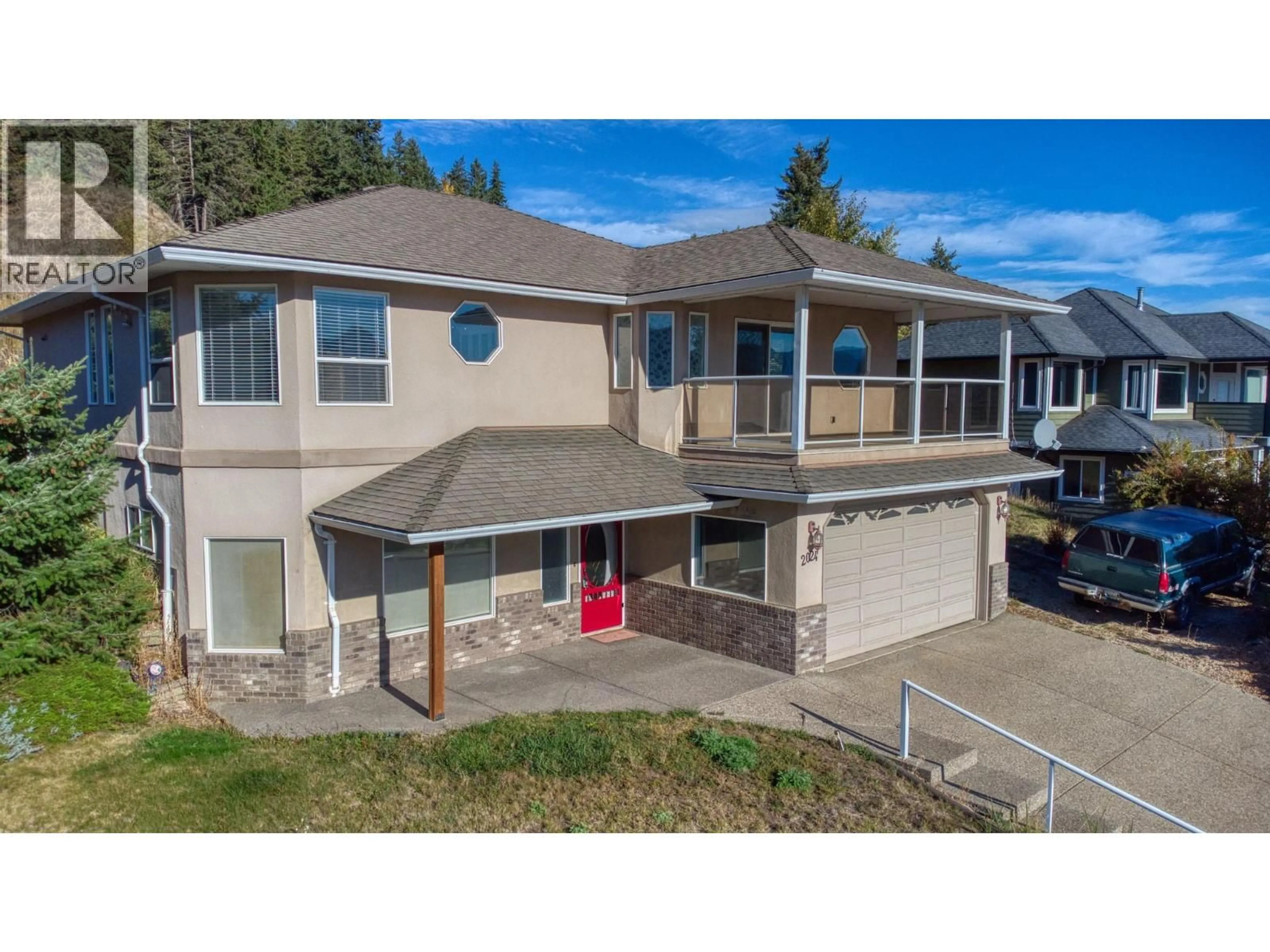 A pic from outside/outdoor area/front of a property/back of a property/a pic from drone, street for 2024 MOUNTAIN VIEW AVENUE, Lumby British Columbia V0E2G0
