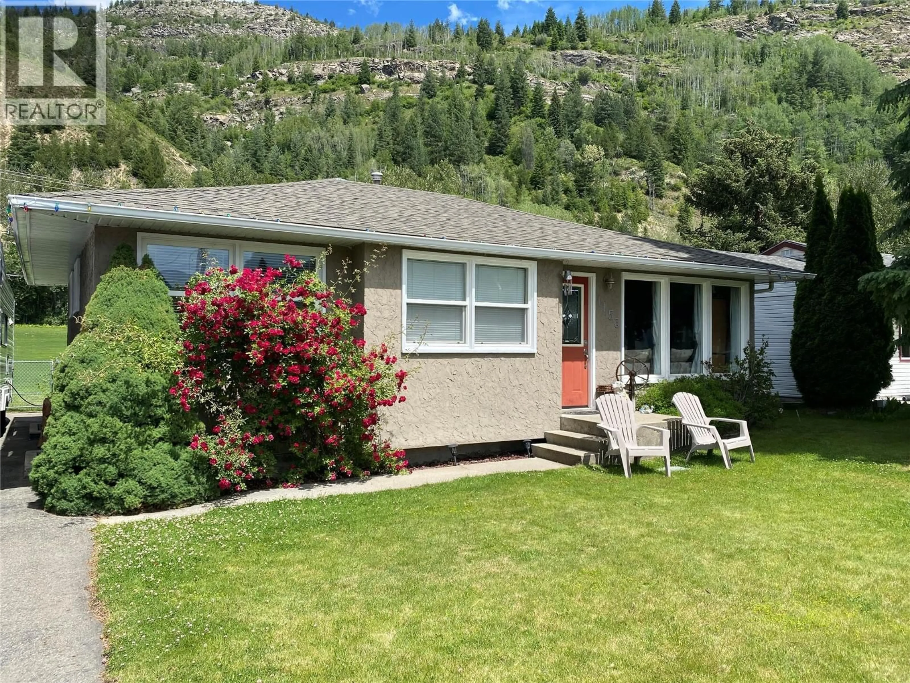 A pic from outside/outdoor area/front of a property/back of a property/a pic from drone, mountain view for 1153 MARIANNA CRESCENT, Trail British Columbia V1R5C1