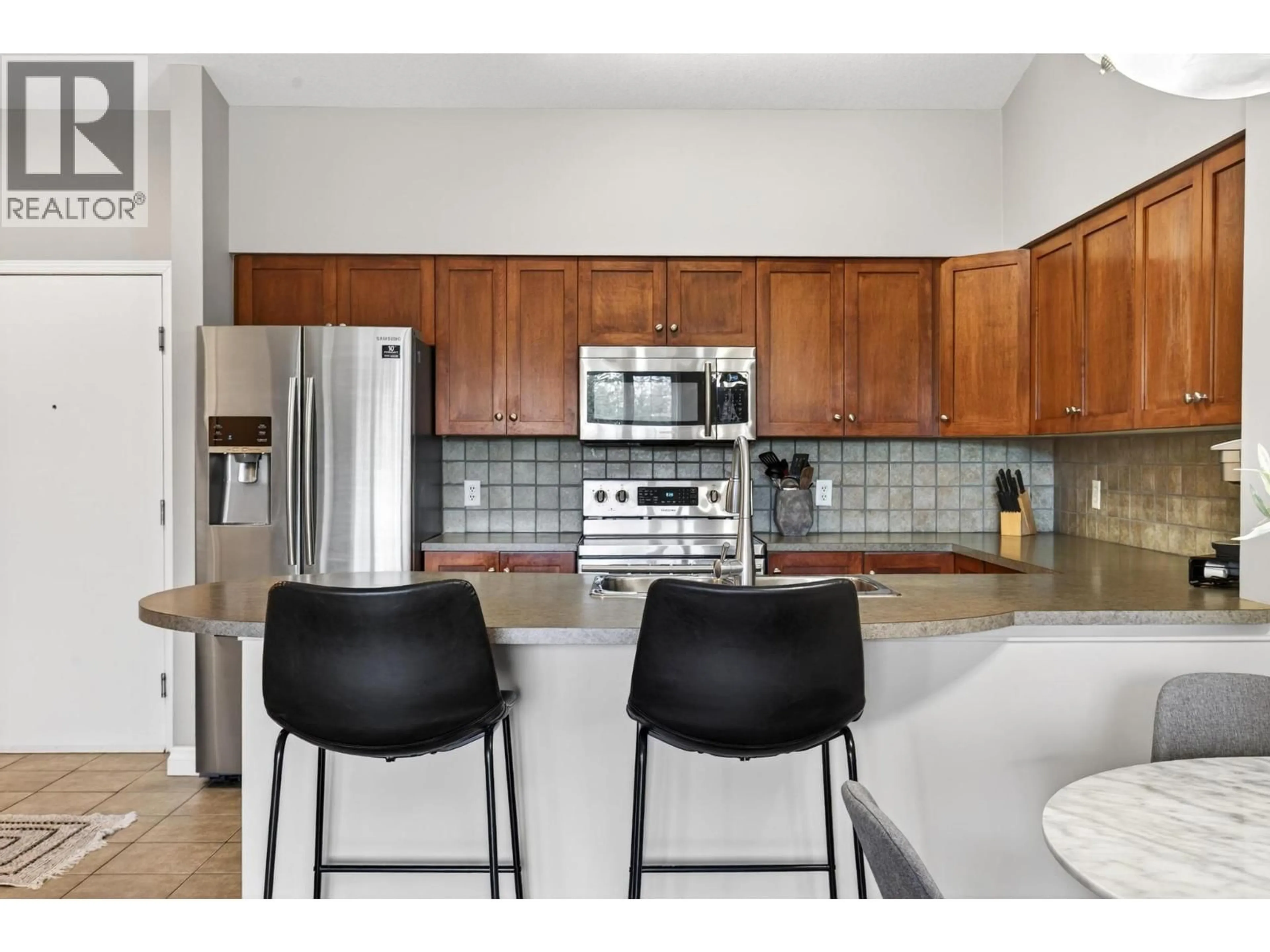 Open concept kitchen, ceramic/tile floor for 1410 - 3168 VIA CENTRALE ROAD, Kelowna British Columbia V1V2R5