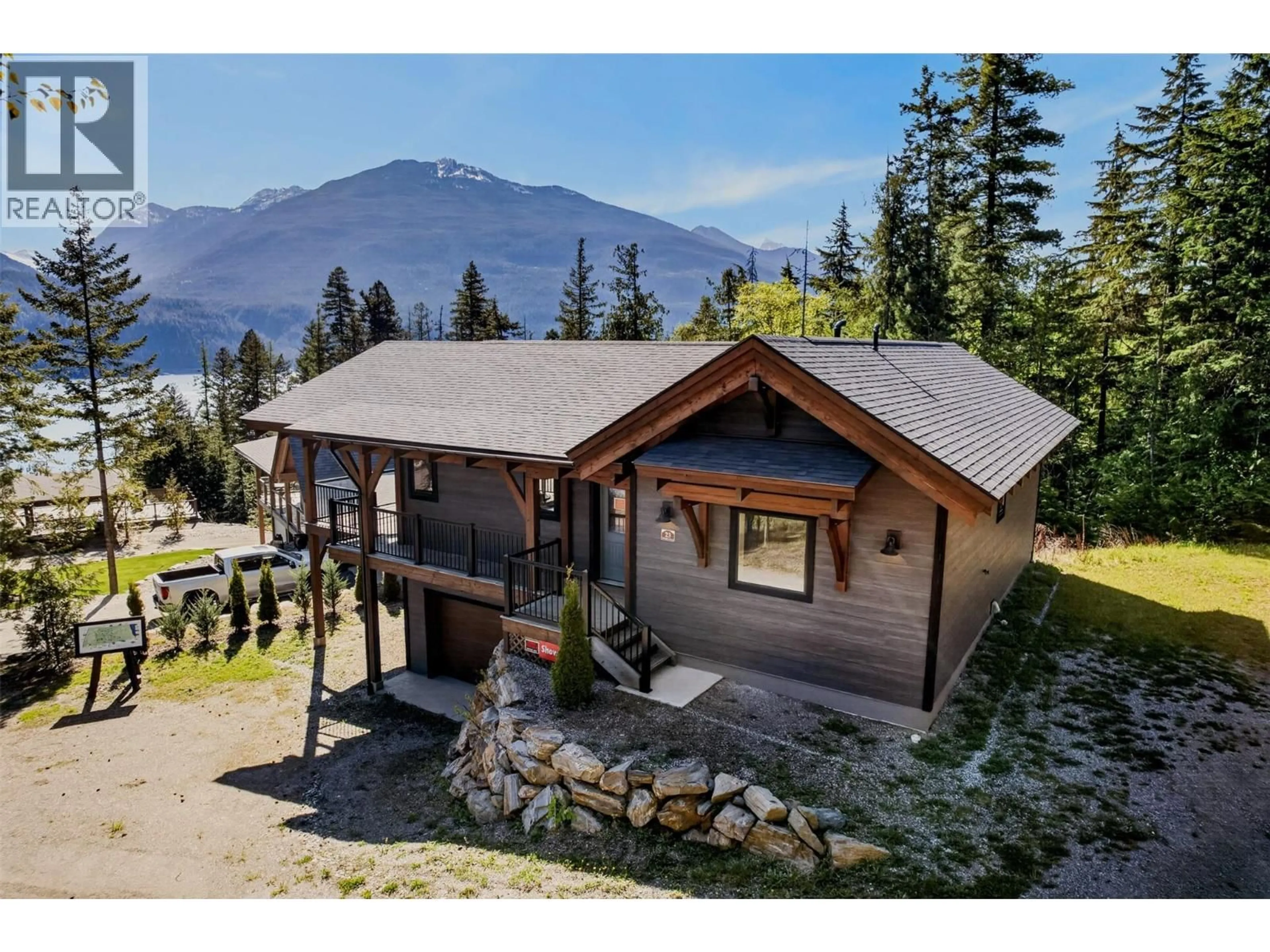 A pic from outside/outdoor area/front of a property/back of a property/a pic from drone, mountain view for 23 BIRCHGROVE BEND, Kaslo British Columbia V0G1M0