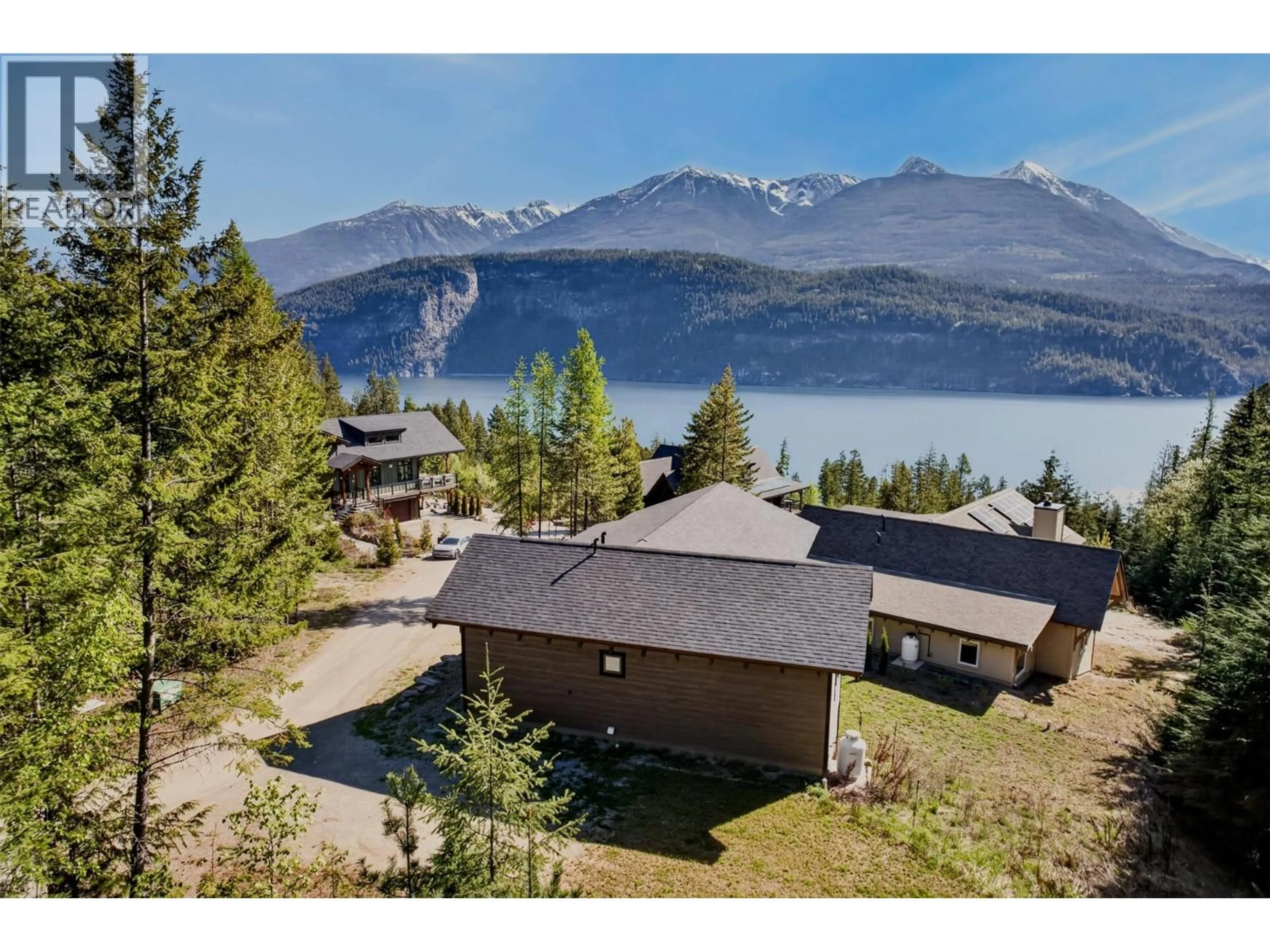 A pic from outside/outdoor area/front of a property/back of a property/a pic from drone, mountain view for 23 BIRCHGROVE BEND, Kaslo British Columbia V0G1M0