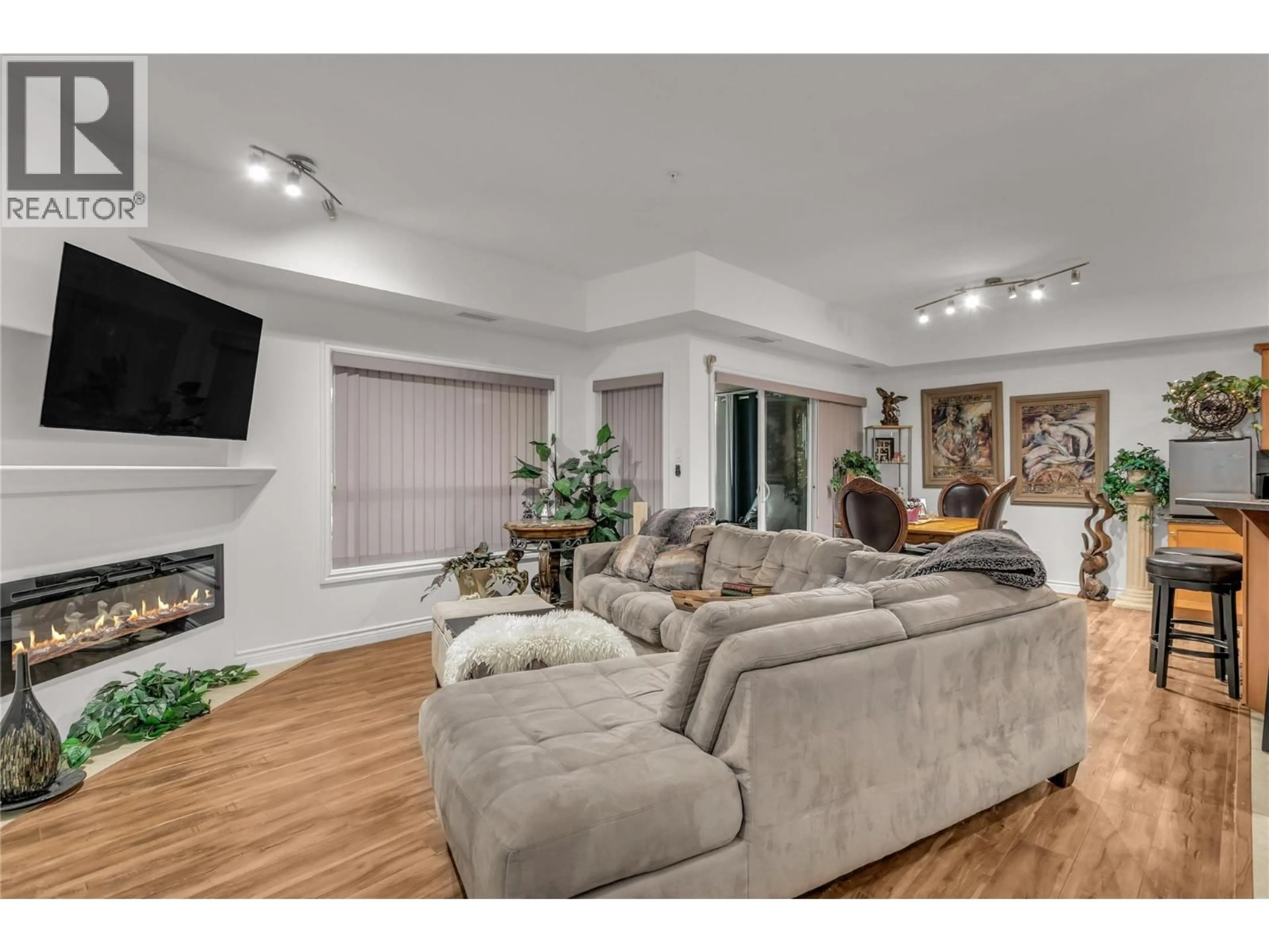 Living room with furniture, unknown for 104 - 1961 DURNIN ROAD, Kelowna British Columbia V1X7Z6