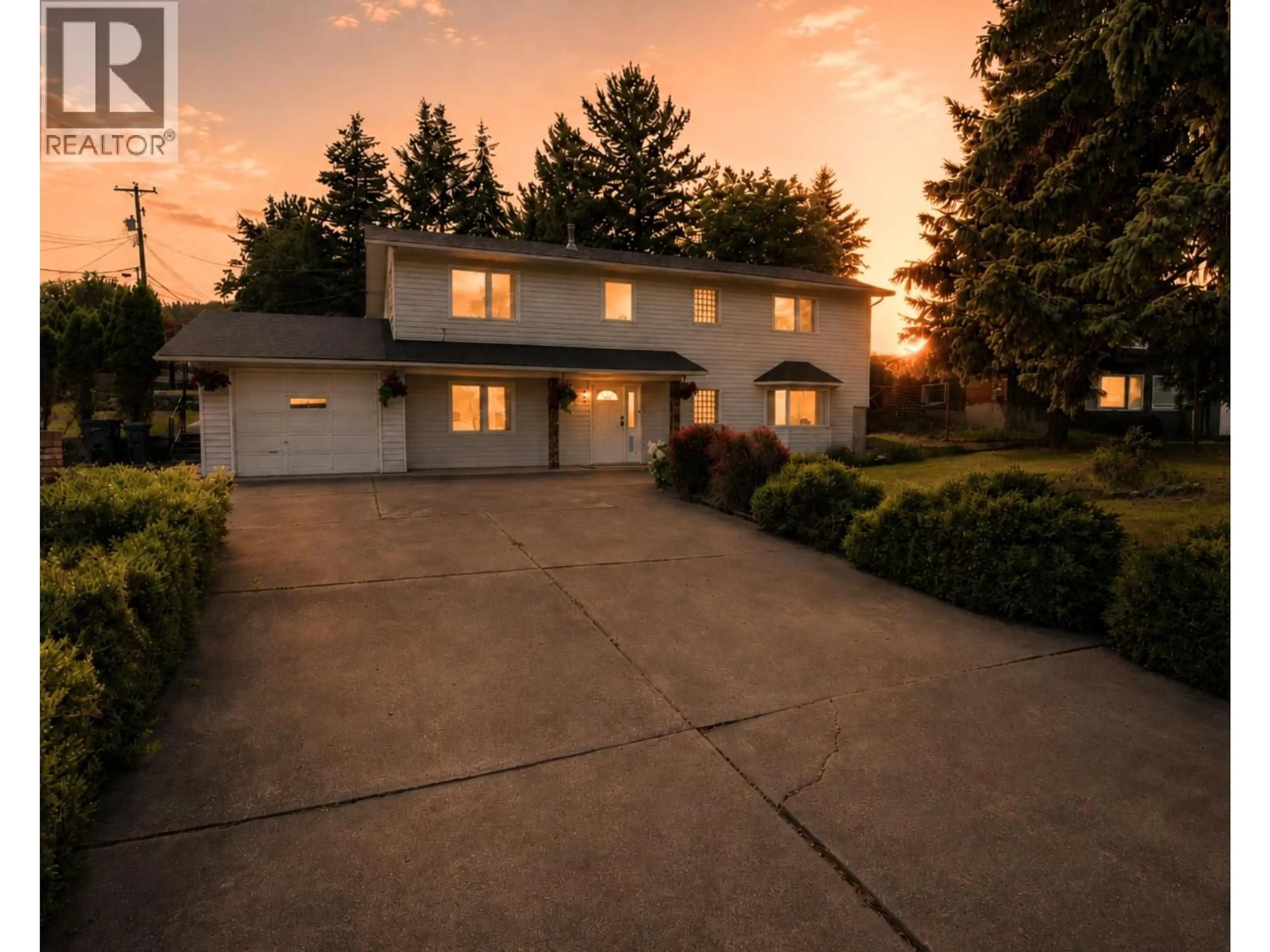A pic from outside/outdoor area/front of a property/back of a property/a pic from drone, street for 7320 OKANAGAN LANDING ROAD, Vernon British Columbia V1H1G6