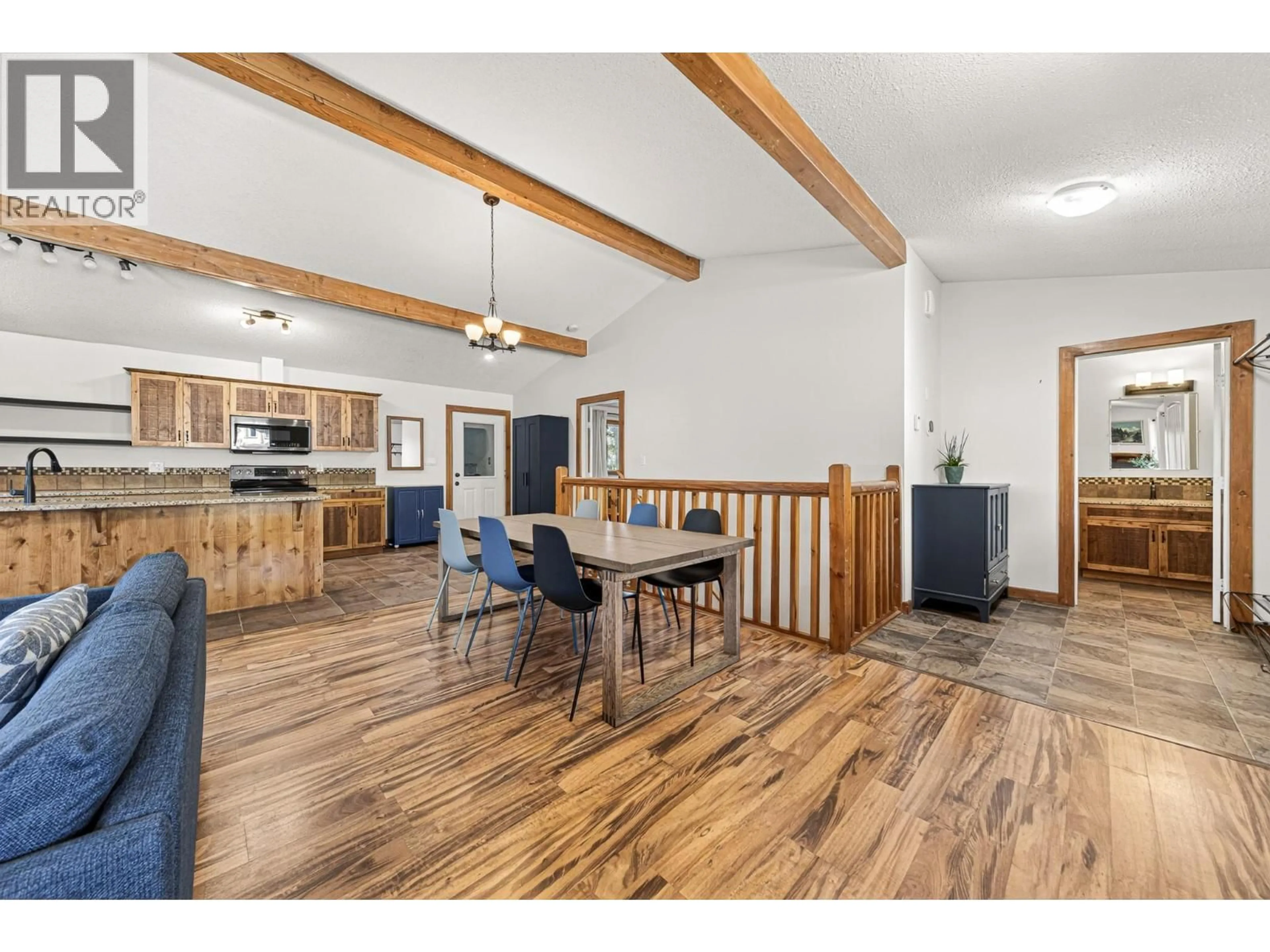 Open concept kitchen, wood/laminate floor for 2058 GOLDEN EAGLE DRIVE, Sparwood British Columbia V0B2G2