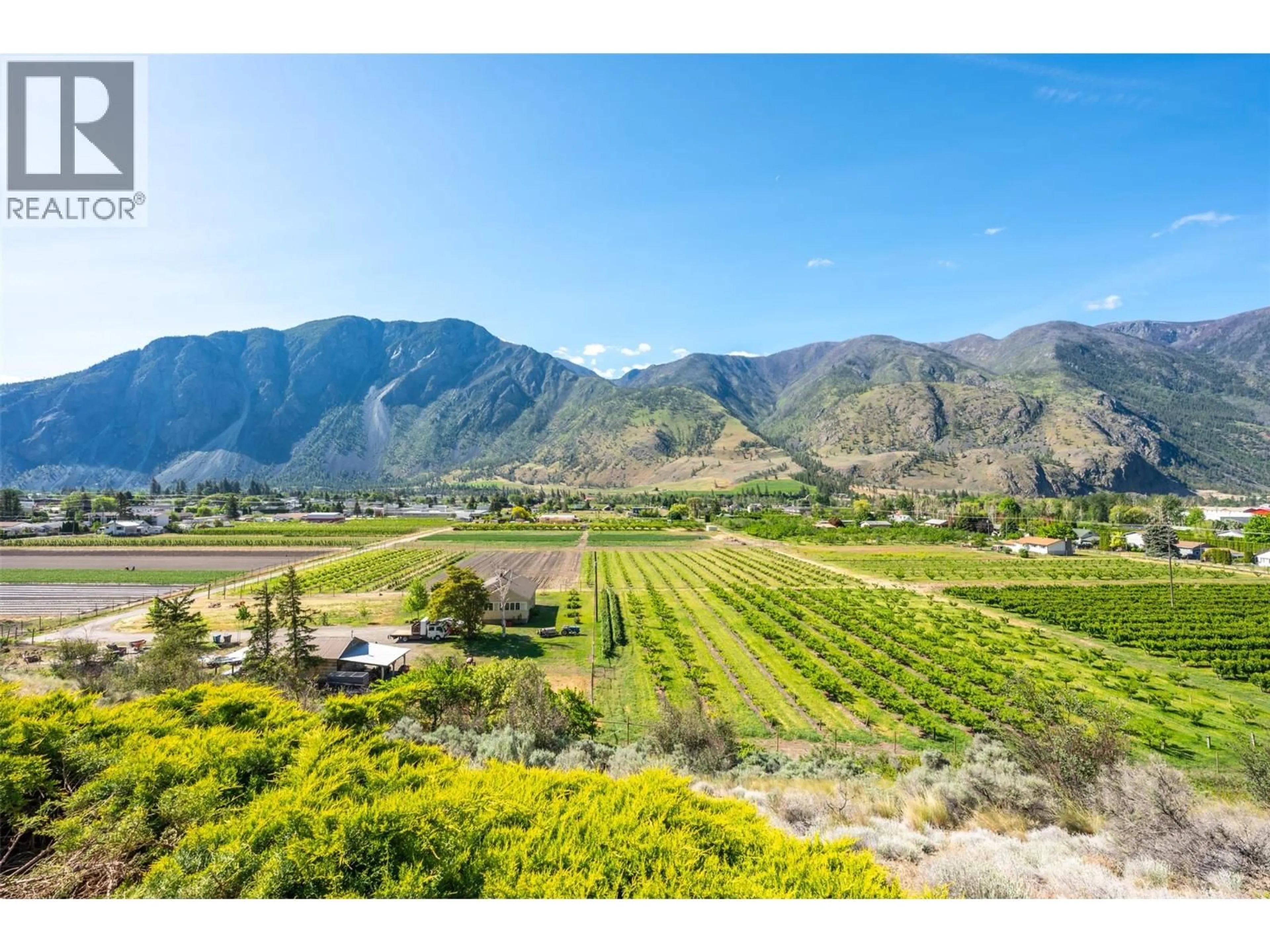 A pic from outside/outdoor area/front of a property/back of a property/a pic from drone, mountain view for 101 2ND AVENUE, Keremeos British Columbia V0X1N2