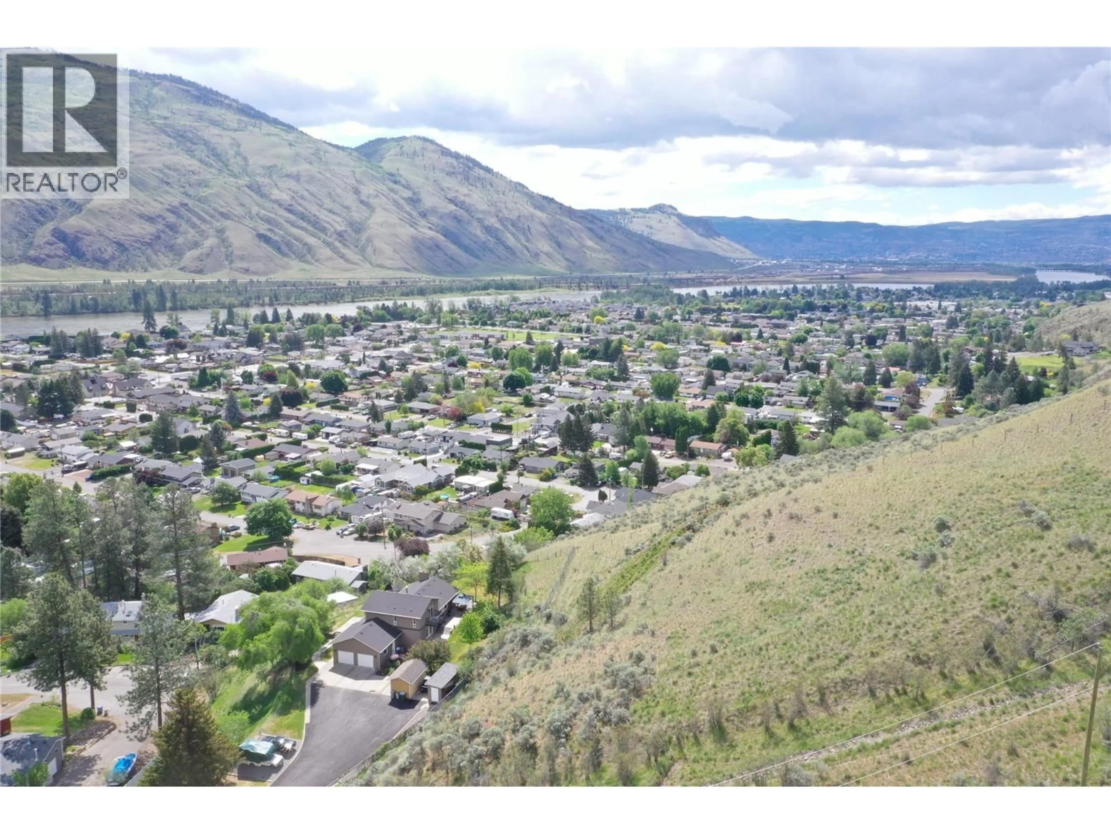 A pic from outside/outdoor area/front of a property/back of a property/a pic from drone, mountain view for 3084 DOHM ROAD, Kamloops British Columbia V2B7L8