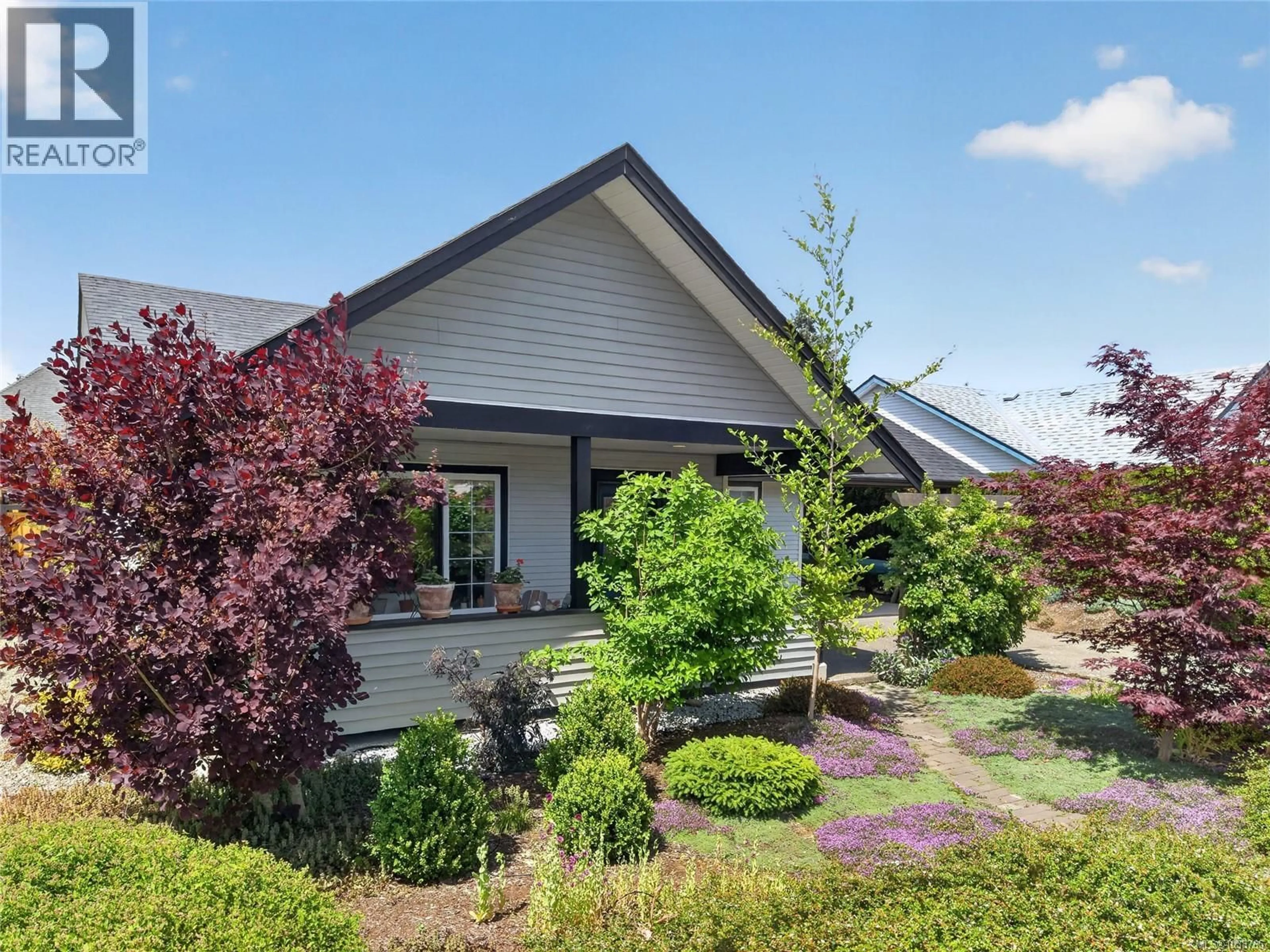 Home with vinyl exterior material, street for 3305 NINTH STREET, Cumberland British Columbia V0R1S0