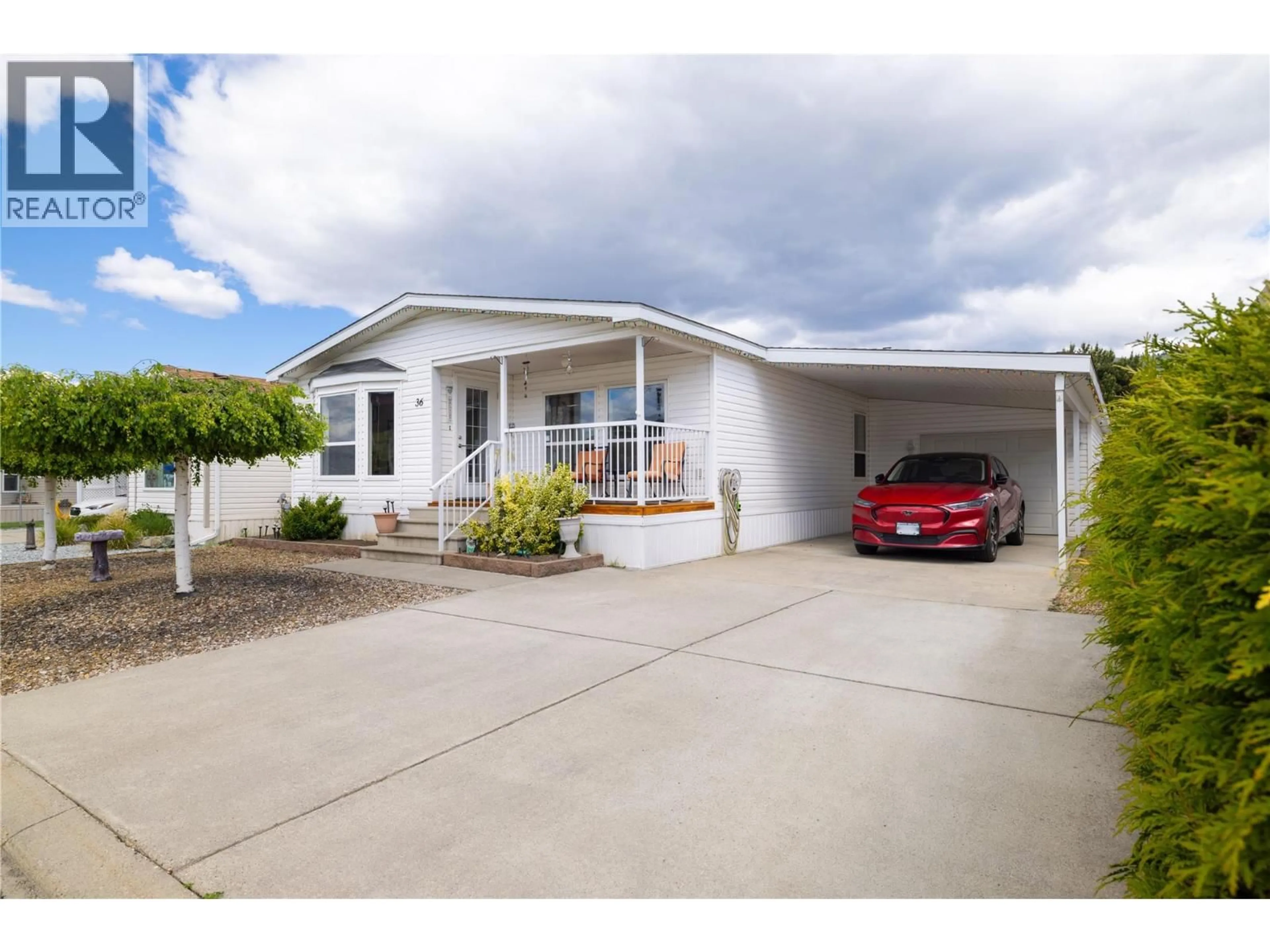 Home with vinyl exterior material, street for 36 - 6688 TRONSON ROAD, Vernon British Columbia V1H1R9