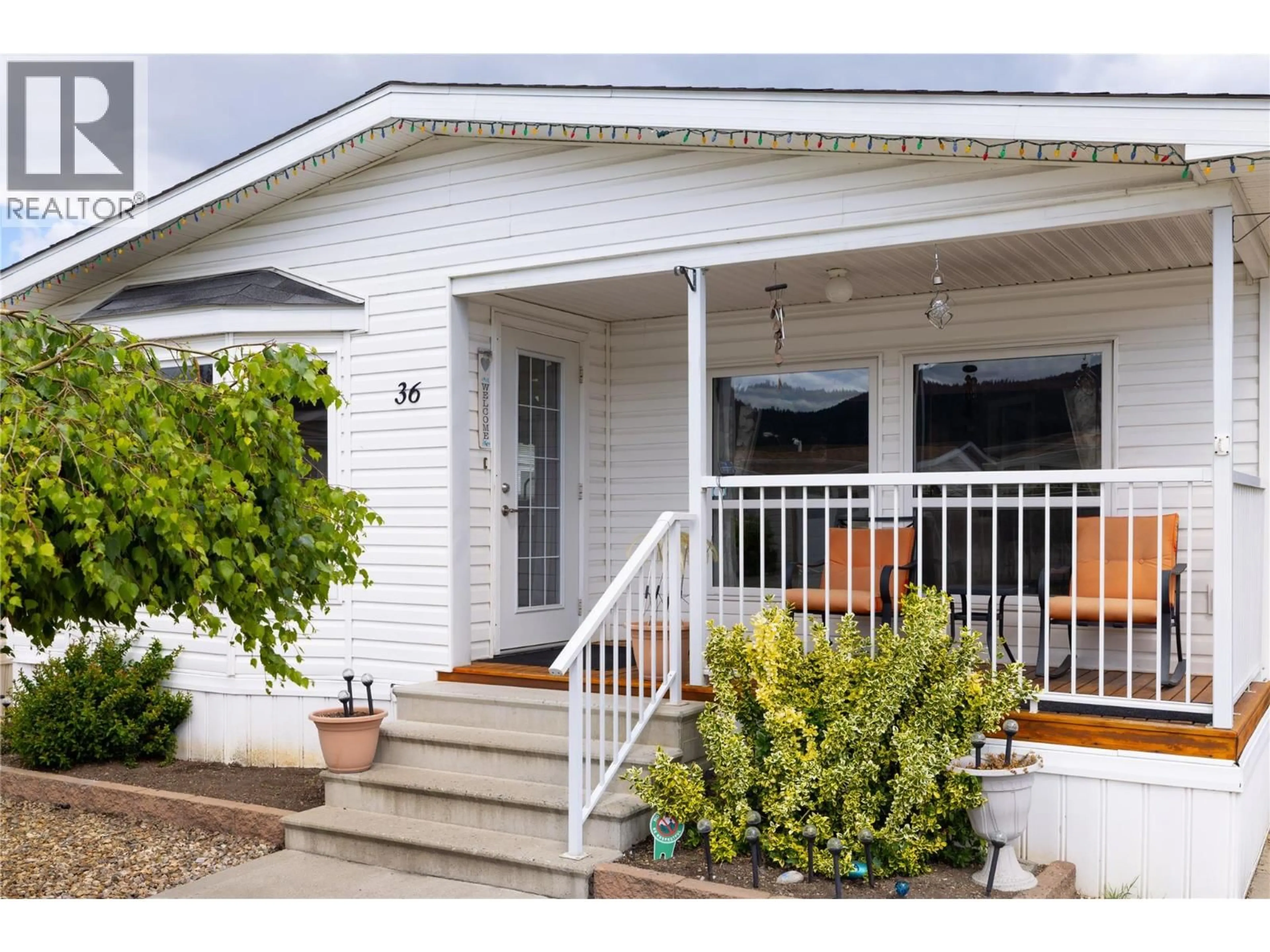 Home with vinyl exterior material, street for 36 - 6688 TRONSON ROAD, Vernon British Columbia V1H1R9