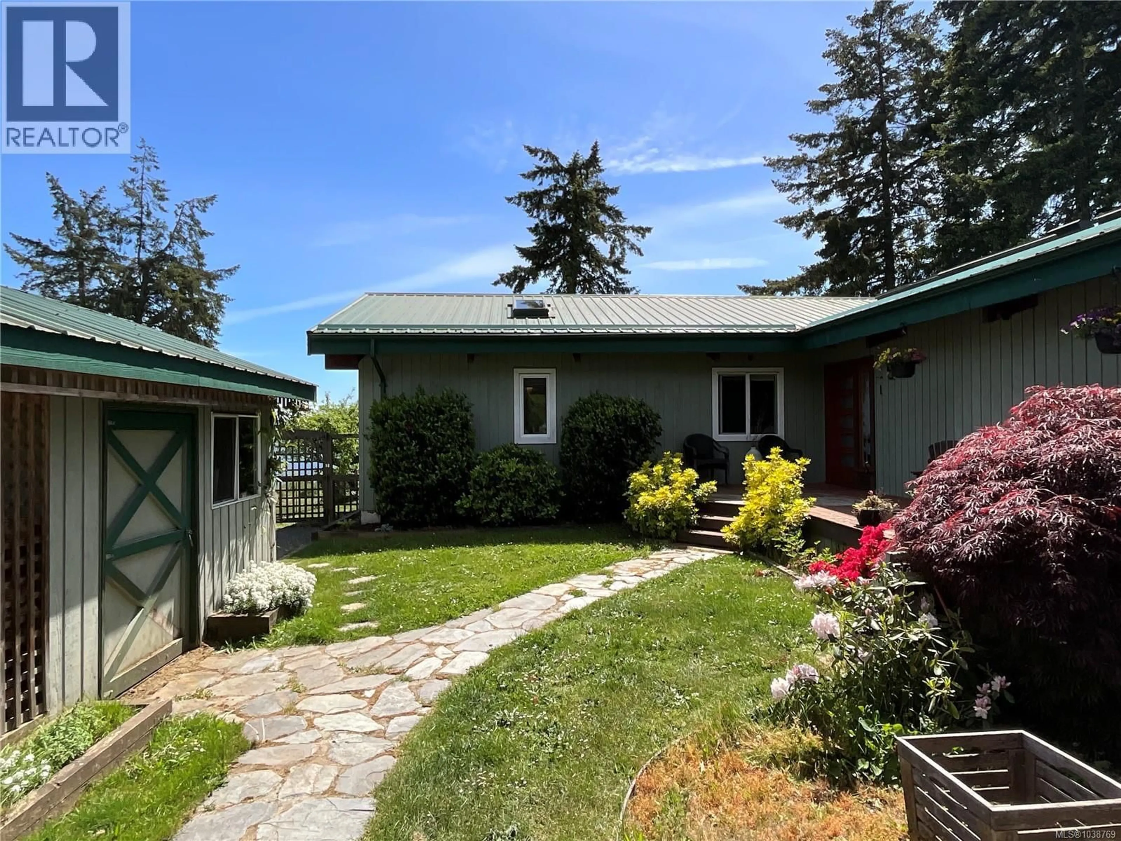 A pic from outside/outdoor area/front of a property/back of a property/a pic from drone, street for 2495 SPRING BEACH DRIVE, Gabriola Island British Columbia V0R1X7