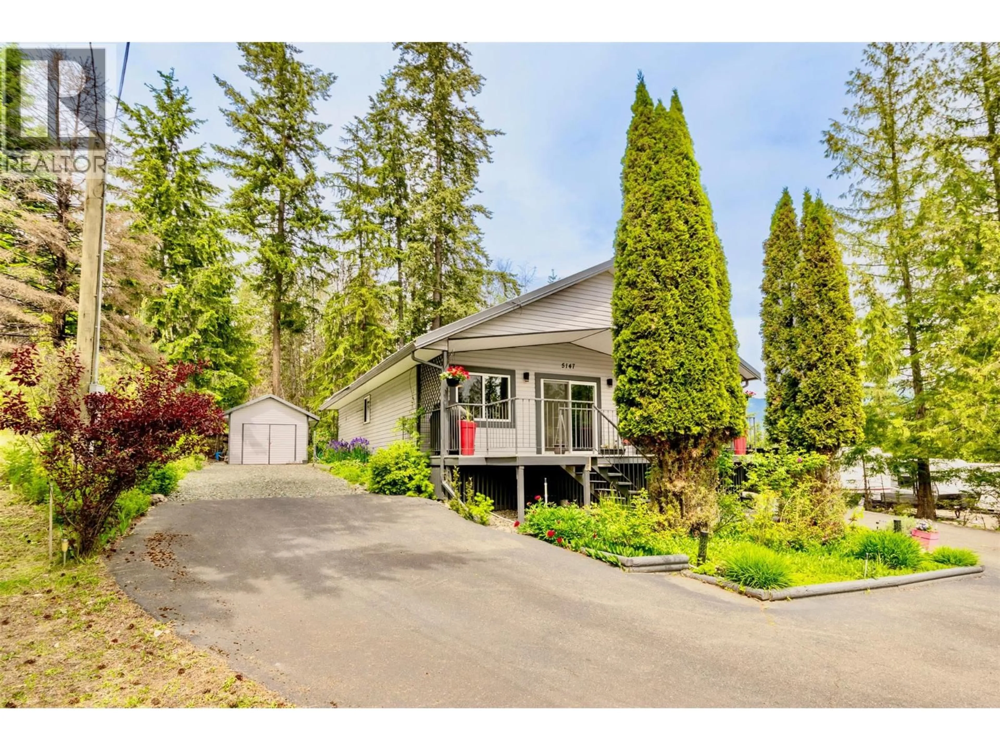Home with vinyl exterior material, street for 5147 TALLINGTON DRIVE, Celista British Columbia V0E1M6