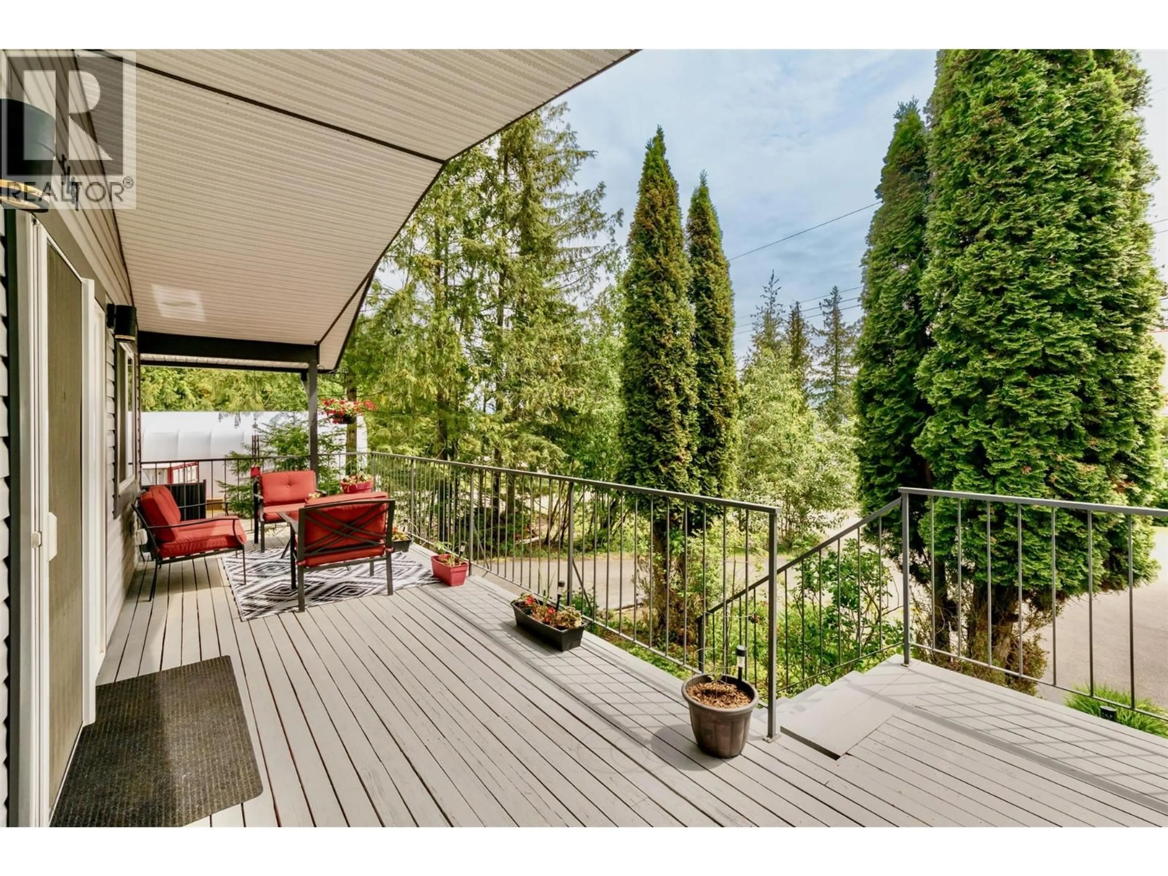 Patio, forest/trees view for 5147 TALLINGTON DRIVE, Celista British Columbia V0E1M6