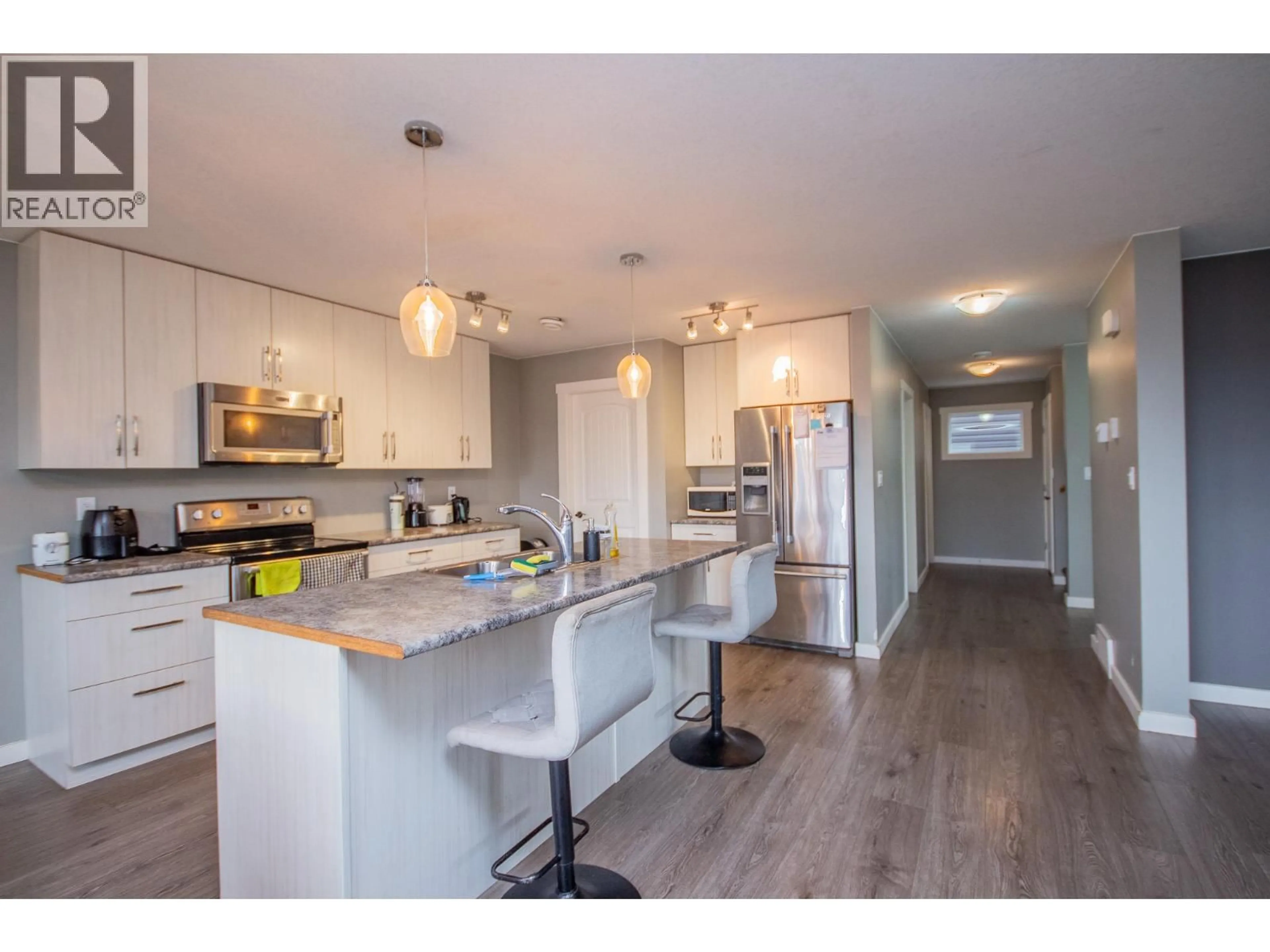 Open concept kitchen, unknown for 8217 18 STREET, Dawson Creek British Columbia V1G0G4