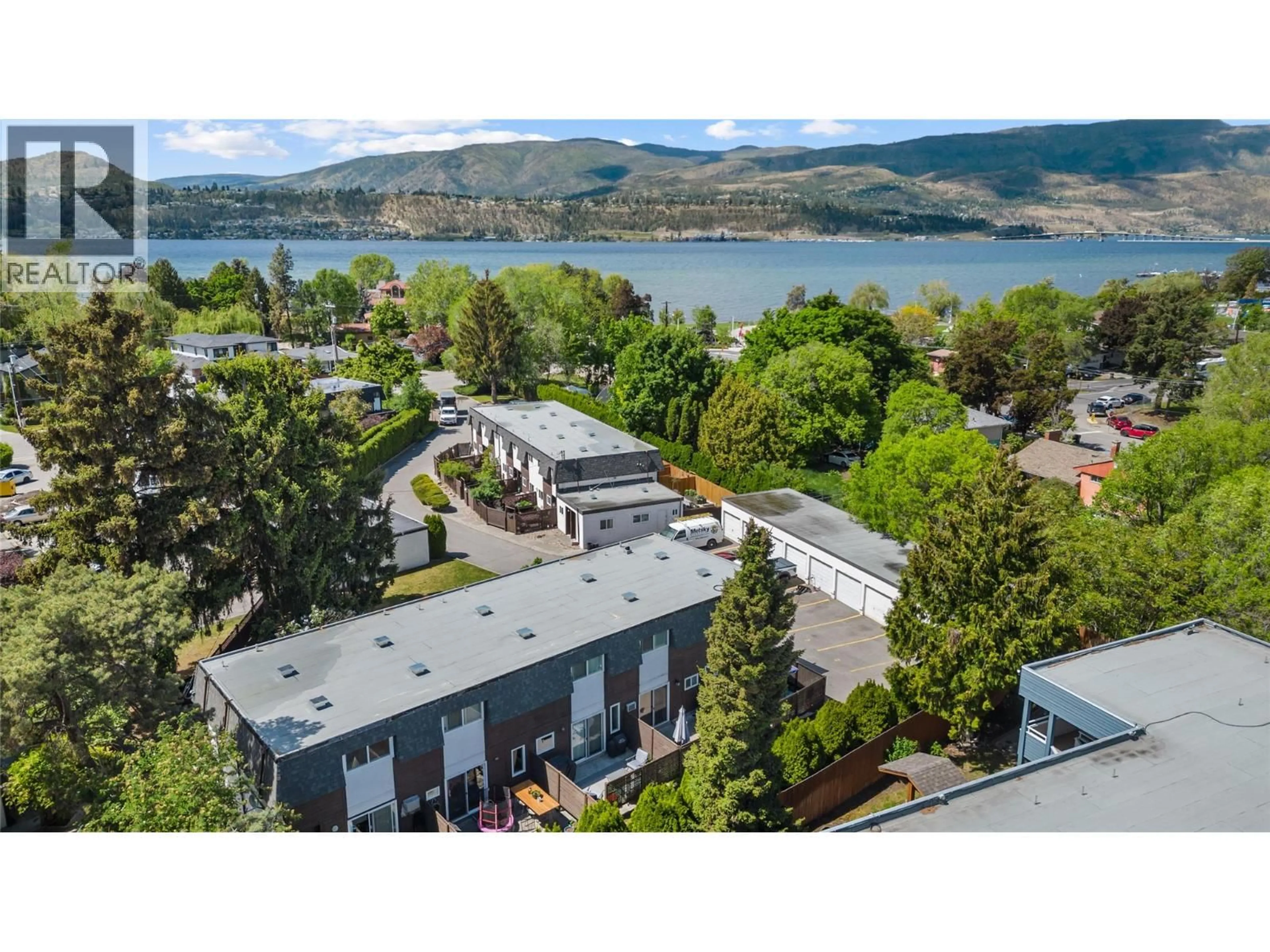 A pic from outside/outdoor area/front of a property/back of a property/a pic from drone, water/lake/river/ocean view for 4 - 3135 WALNUT ROAD, Kelowna British Columbia V1W3T6