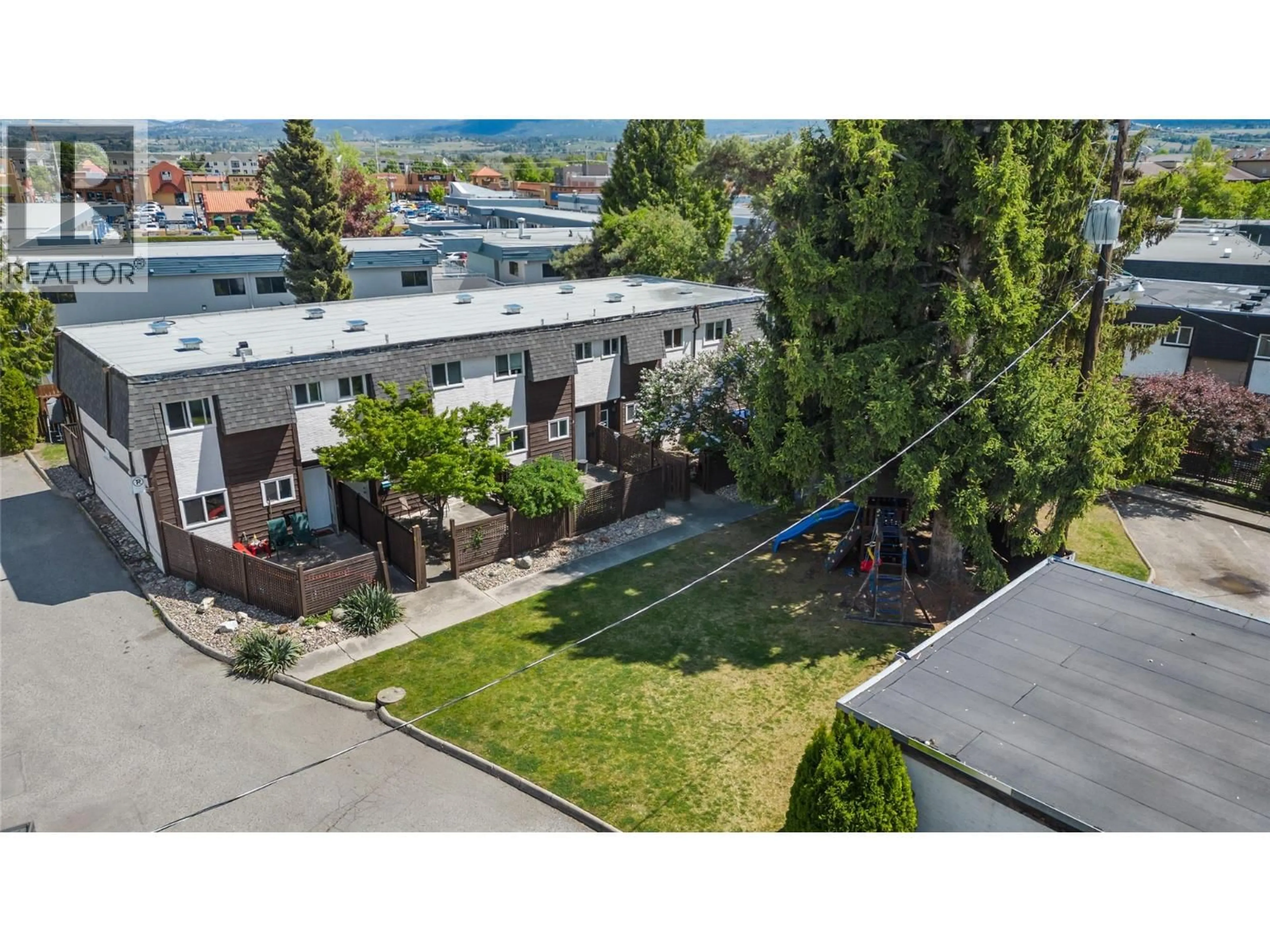A pic from outside/outdoor area/front of a property/back of a property/a pic from drone, unknown for 4 - 3135 WALNUT ROAD, Kelowna British Columbia V1W3T6