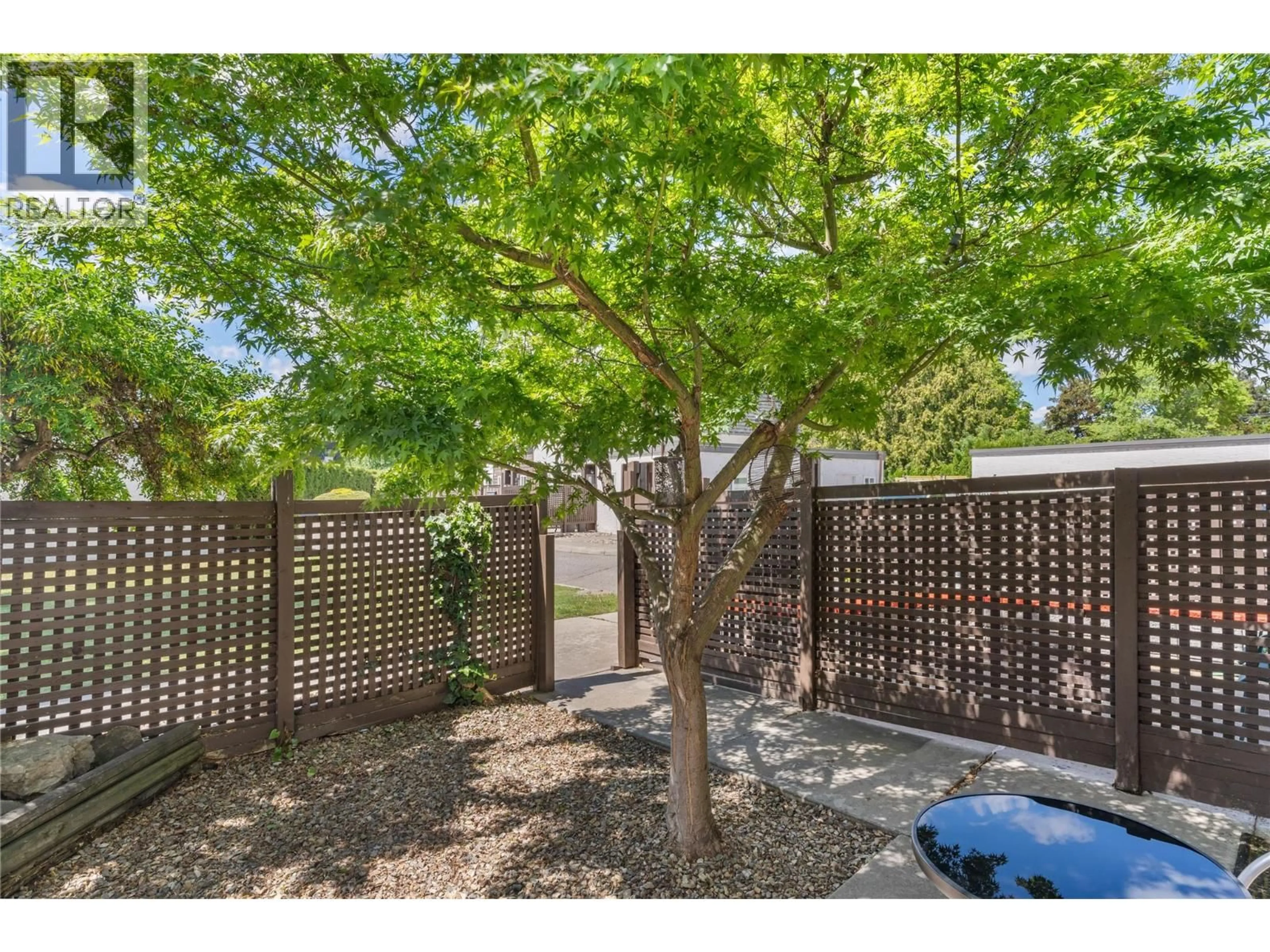 A pic from outside/outdoor area/front of a property/back of a property/a pic from drone, unknown for 4 - 3135 WALNUT ROAD, Kelowna British Columbia V1W3T6