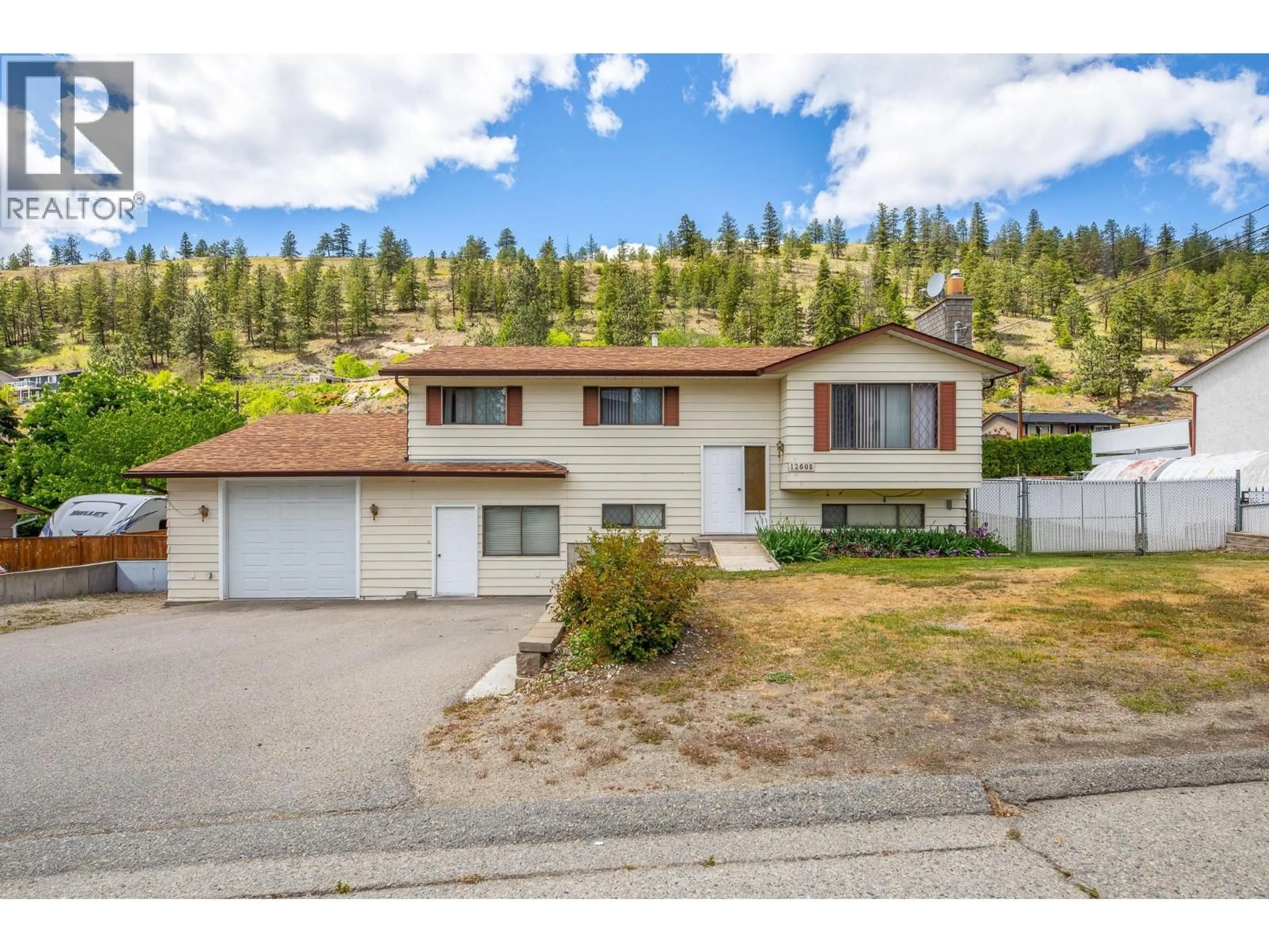 A pic from outside/outdoor area/front of a property/back of a property/a pic from drone, mountain view for 12608 GANZEVELD AVENUE, Summerland British Columbia V0H1Z8