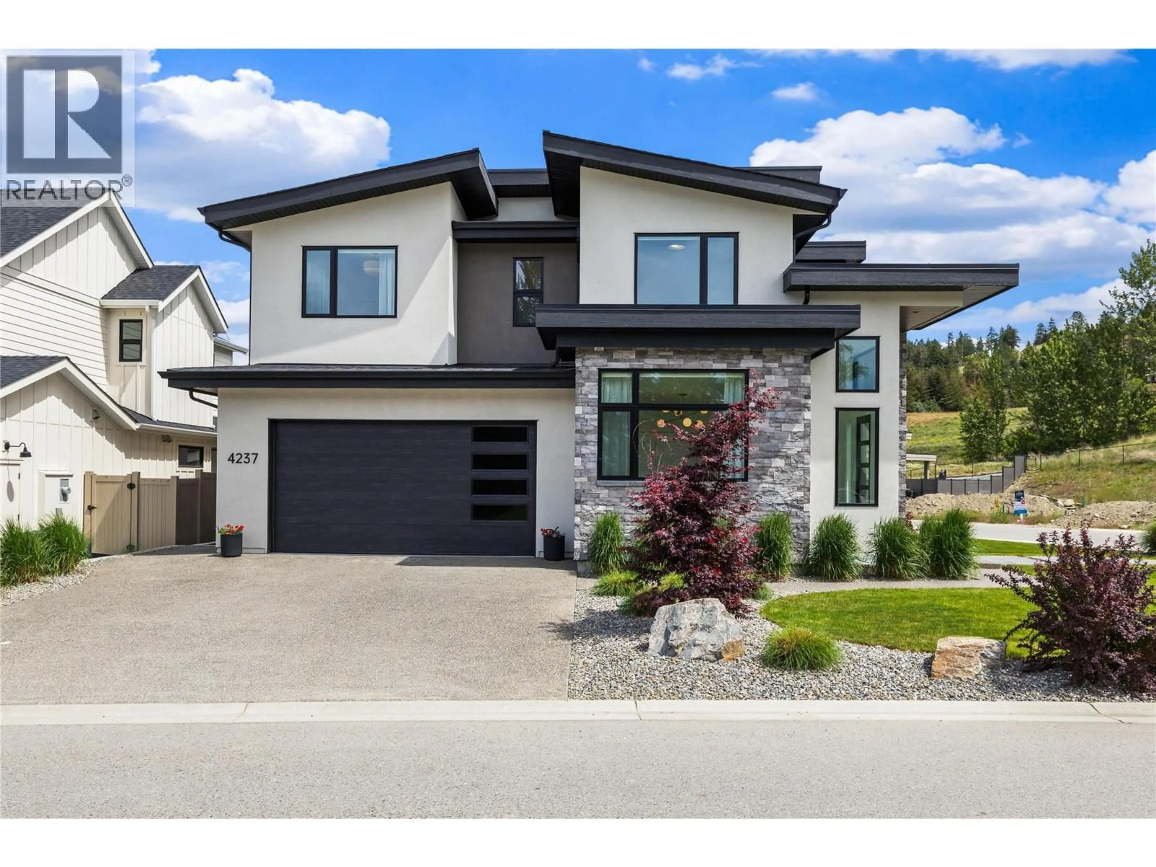 Home with brick exterior material, street for 4237 RUSSO STREET, Kelowna British Columbia V1W0C6