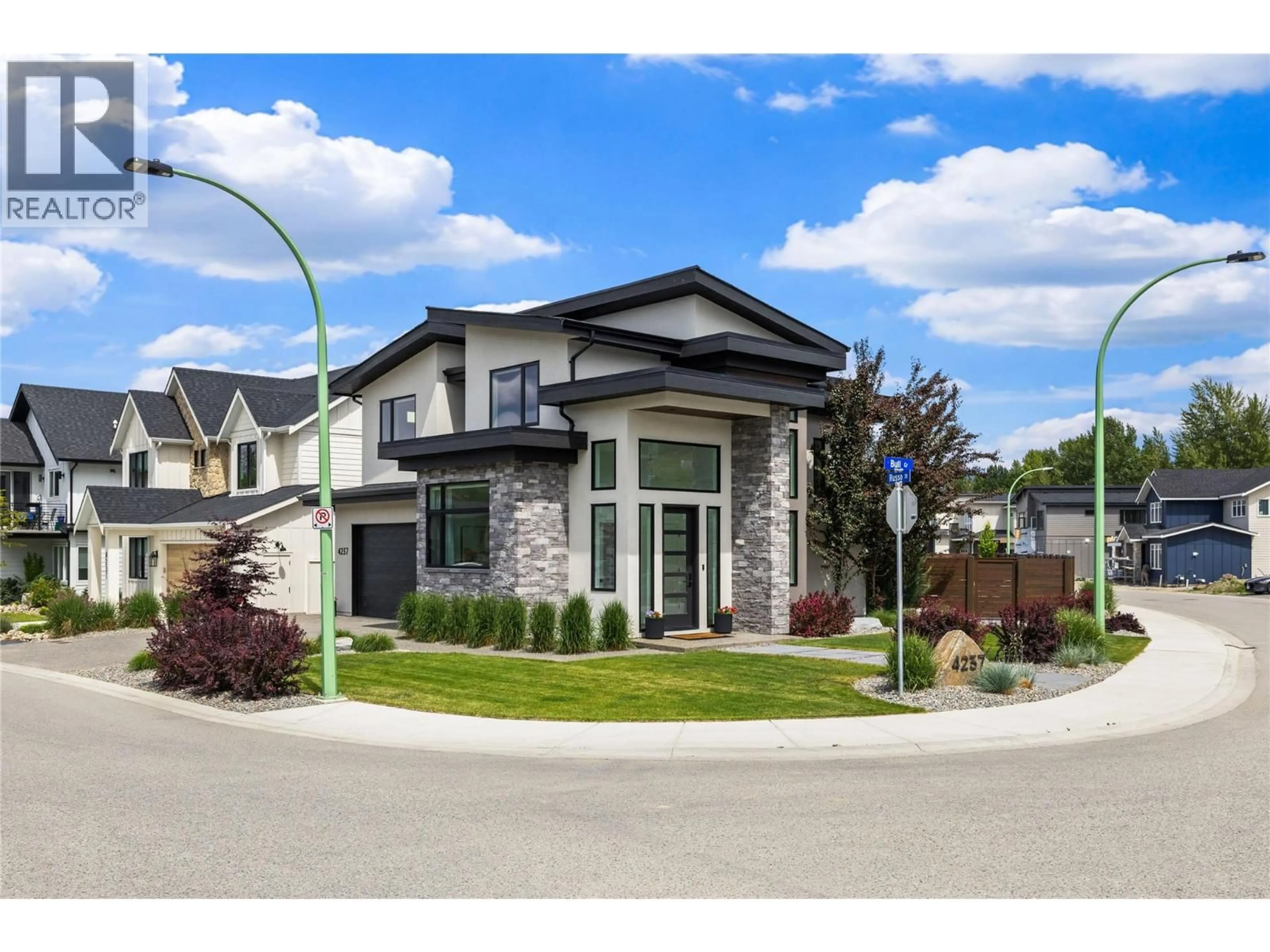 Home with vinyl exterior material, street for 4237 RUSSO STREET, Kelowna British Columbia V1W0C6