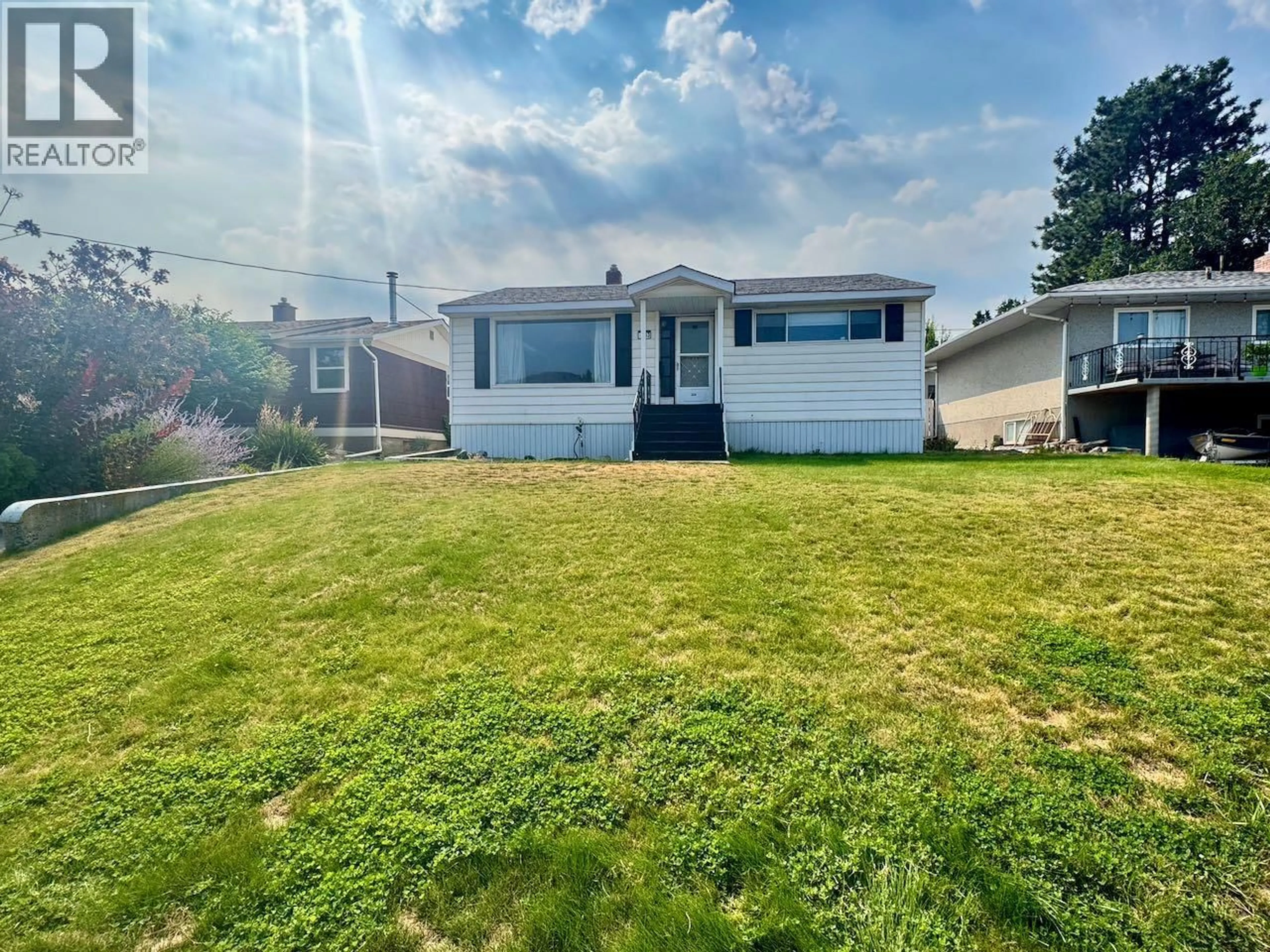 A pic from outside/outdoor area/front of a property/back of a property/a pic from drone, street for 743 DOUGLAS STREET, Kamloops British Columbia V2C3C7
