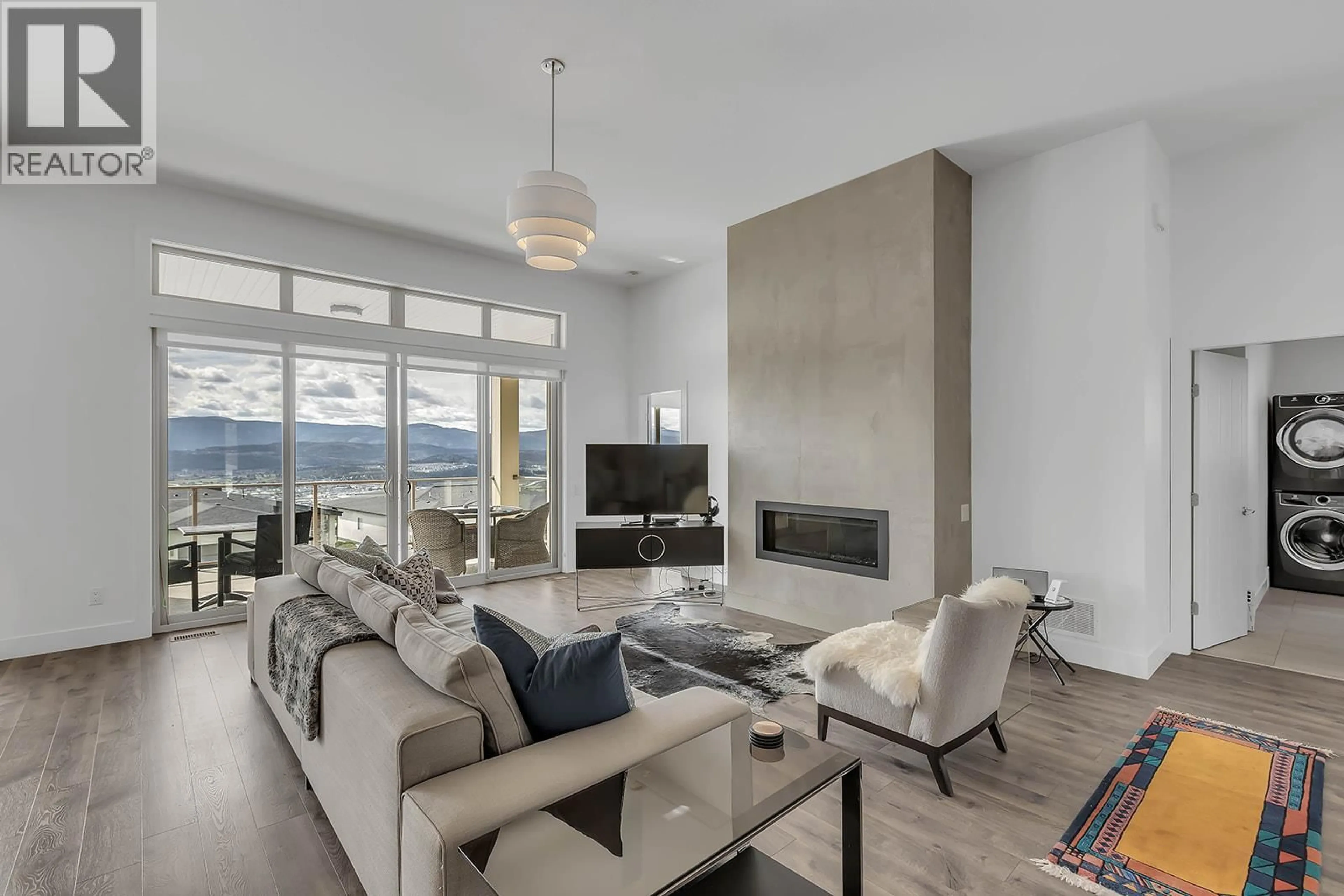 Living room with furniture, unknown for 1796 TOWER RANCH BOULEVARD, Kelowna British Columbia V1P1B5