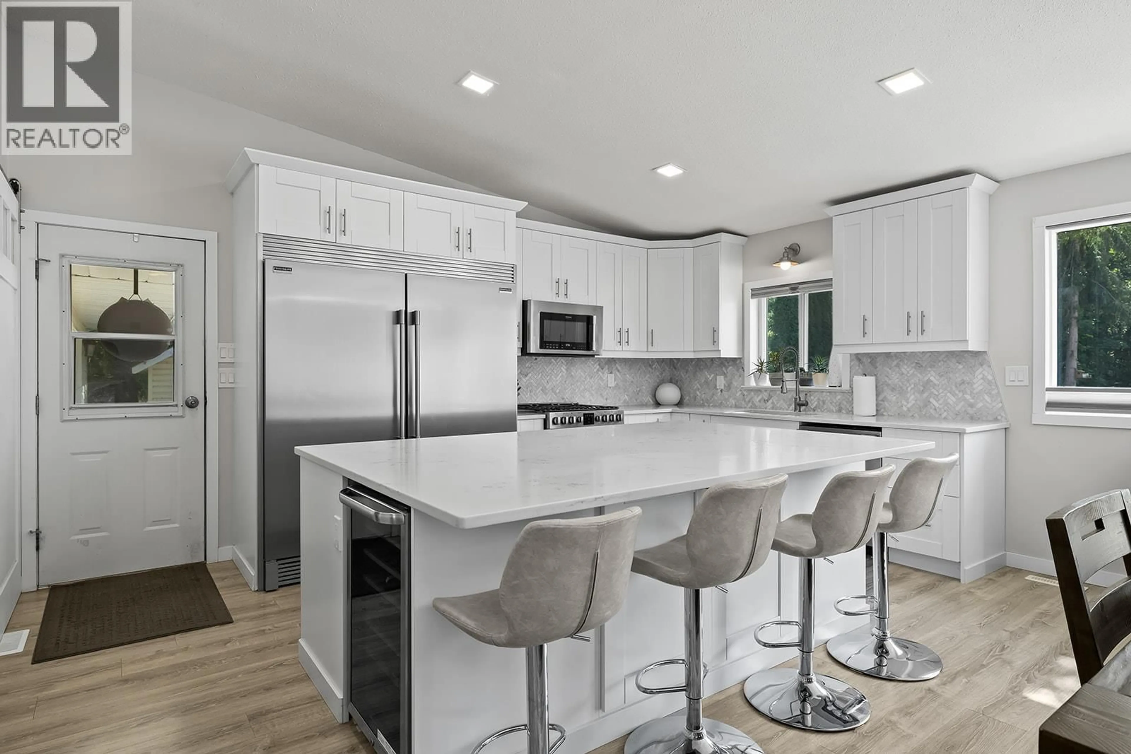 Open concept kitchen, ceramic/tile floor for 2239 MAYER ROAD, Kelowna British Columbia V1W2G2