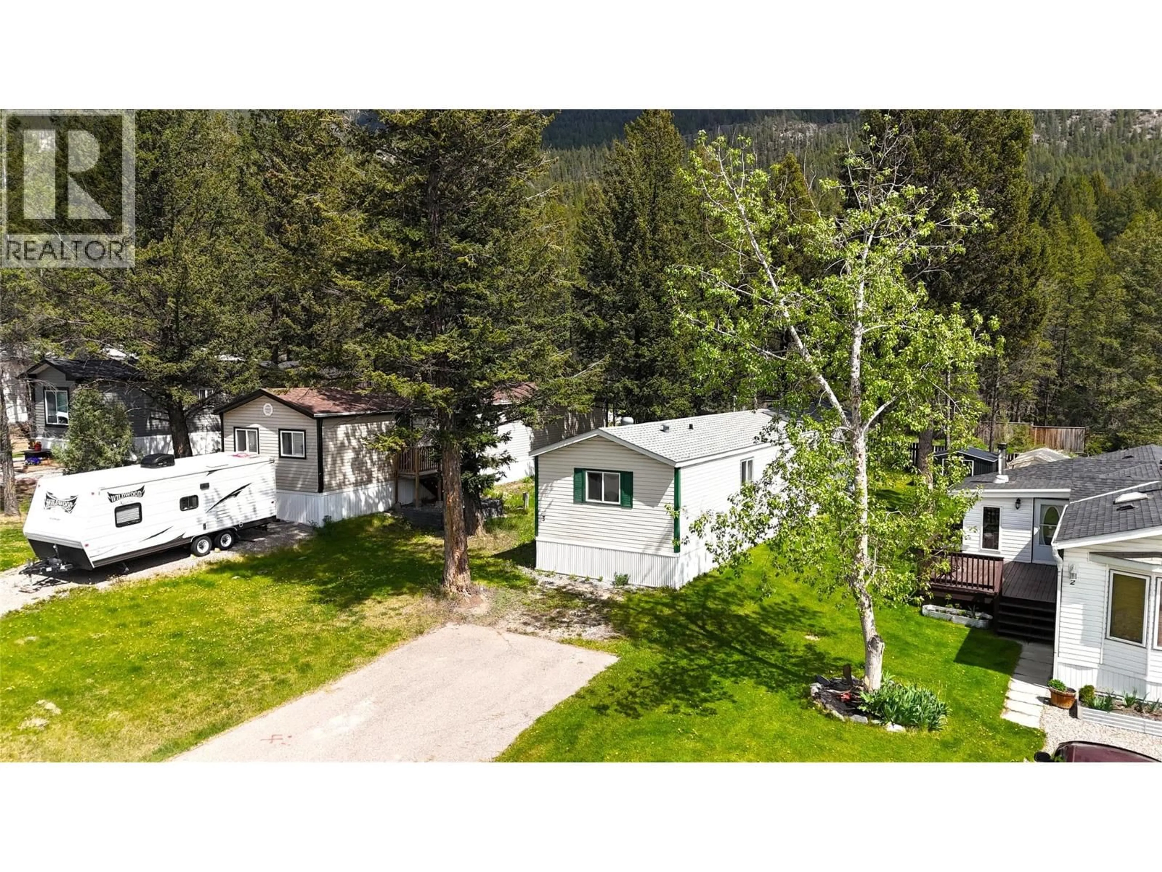 A pic from outside/outdoor area/front of a property/back of a property/a pic from drone, unknown for 6-8561 EACRETT ROAD, Dry Gulch British Columbia V0A1M0