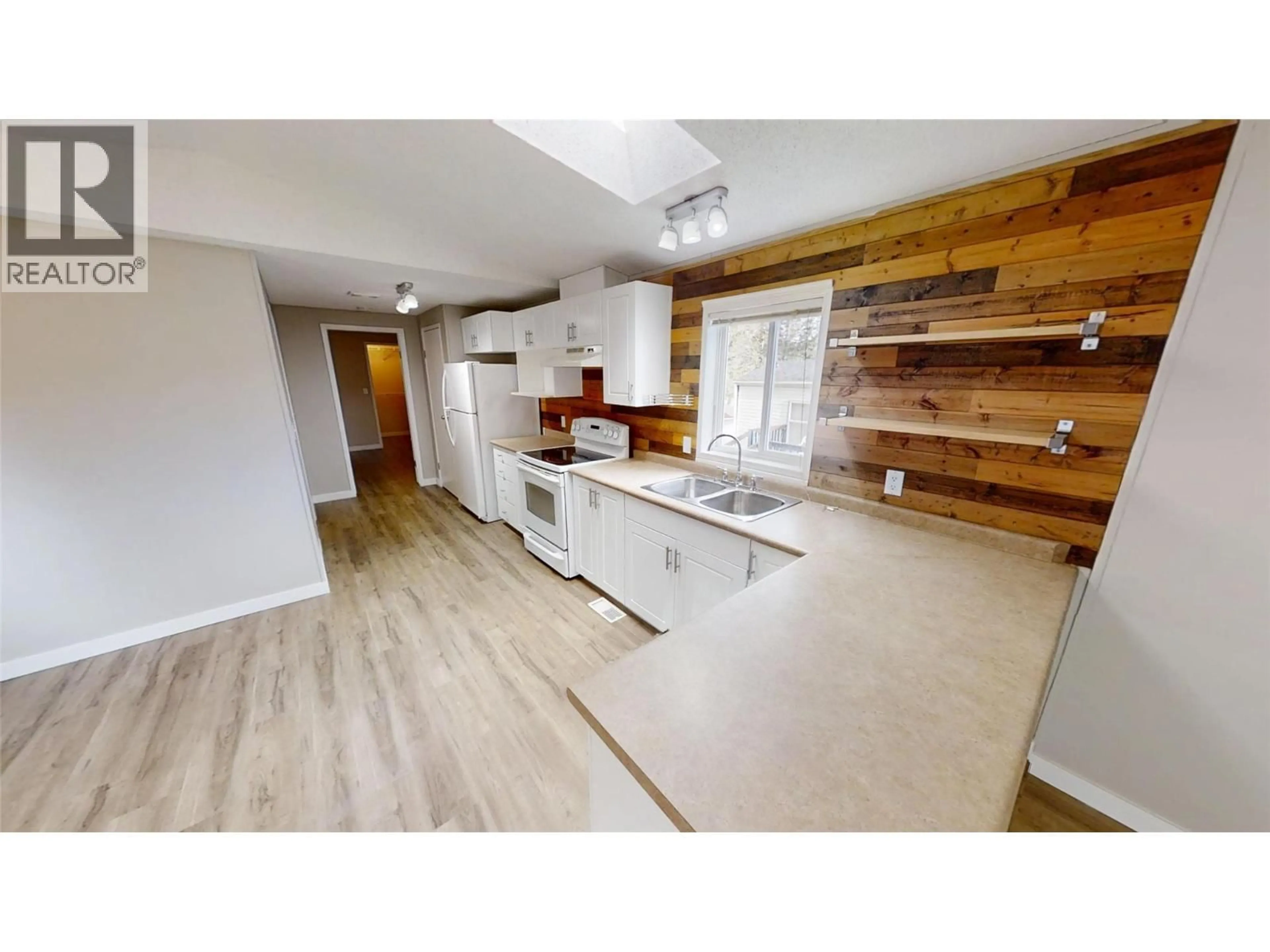 Open concept kitchen, wood/laminate floor for 6-8561 EACRETT ROAD, Dry Gulch British Columbia V0A1M0