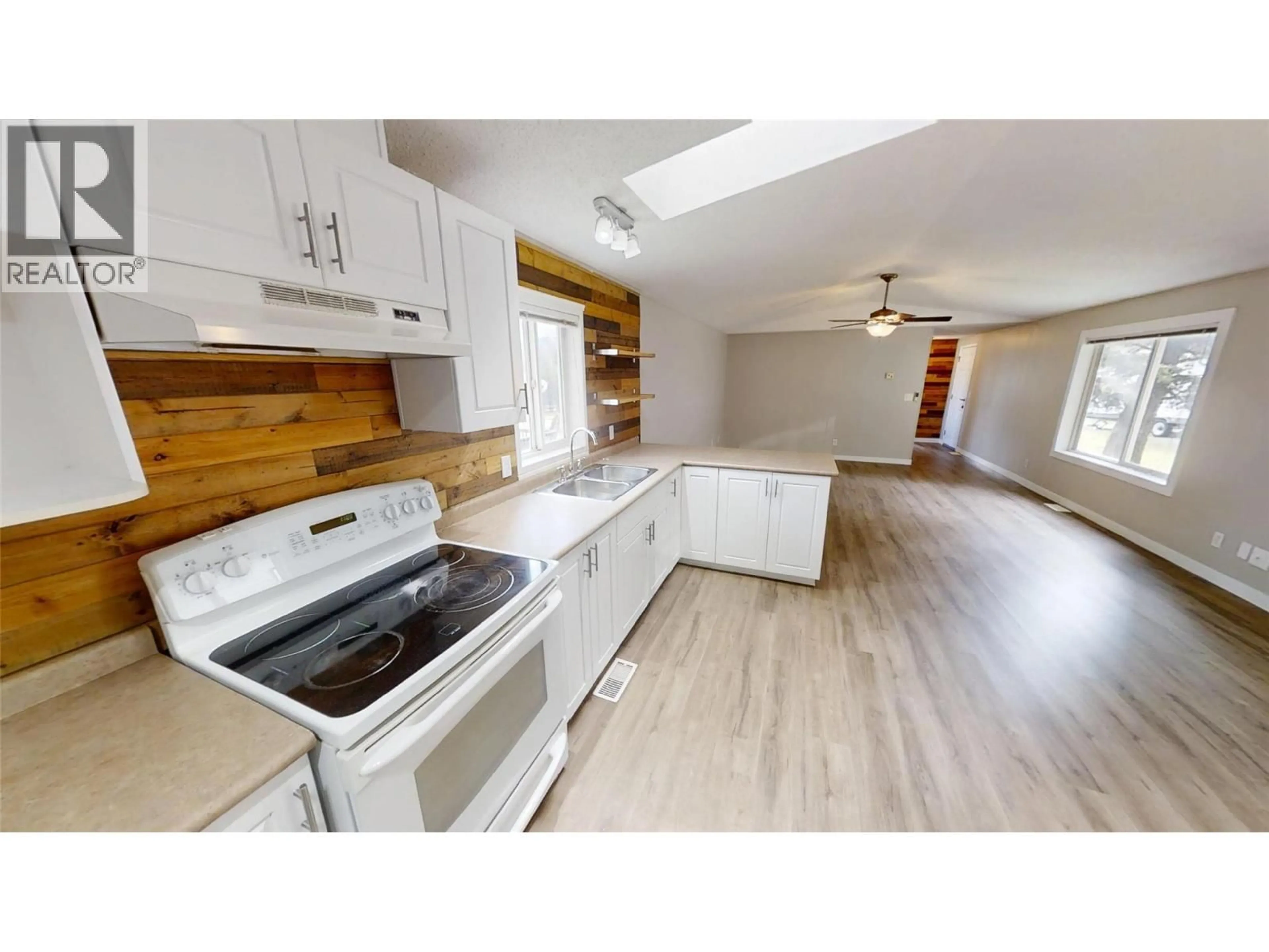 Open concept kitchen, wood/laminate floor for 6-8561 EACRETT ROAD, Dry Gulch British Columbia V0A1M0