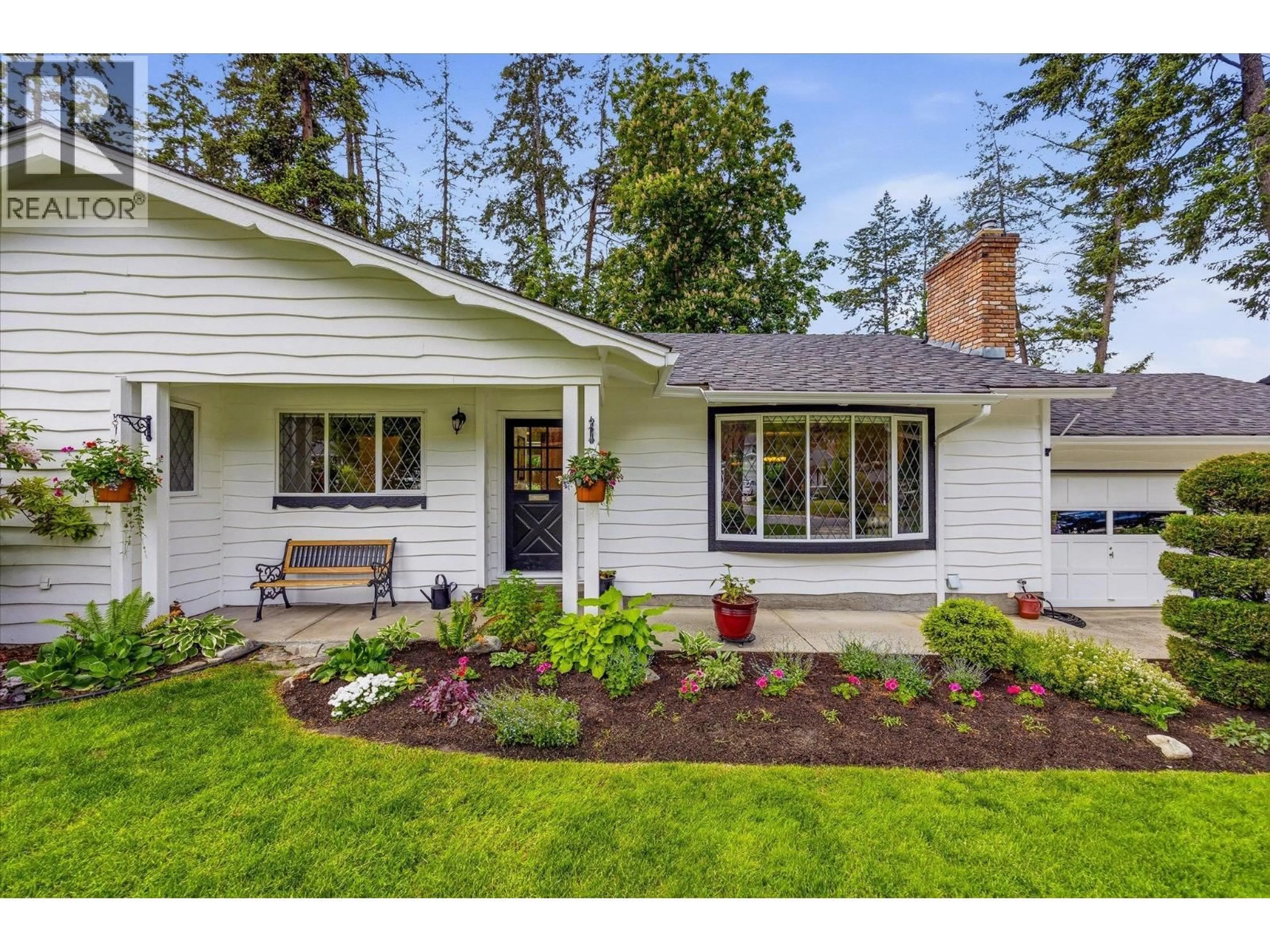 Home with vinyl exterior material, street for 811 CORONADO CRESCENT, Kelowna British Columbia V1W2K5