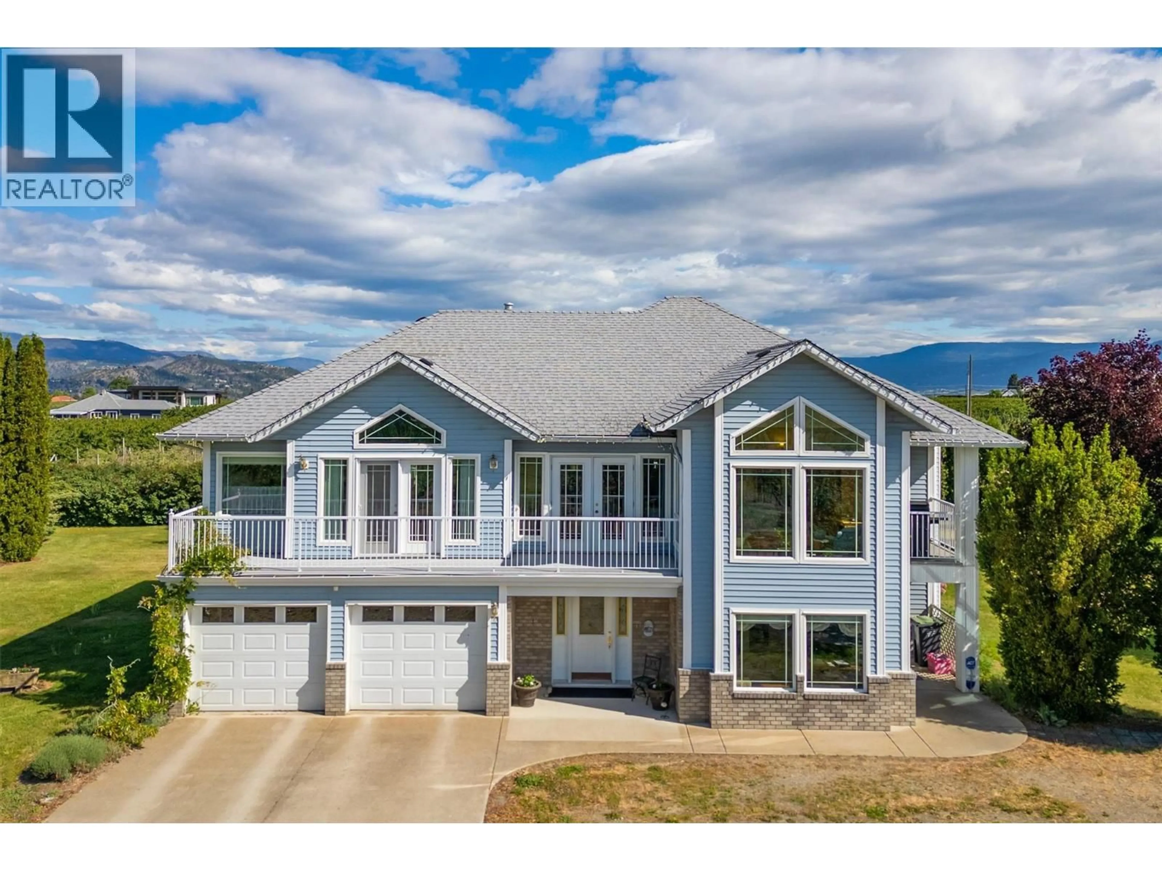 Home with vinyl exterior material, mountain view for 3520 FITZGERALD ROAD, Kelowna British Columbia V1W4G5