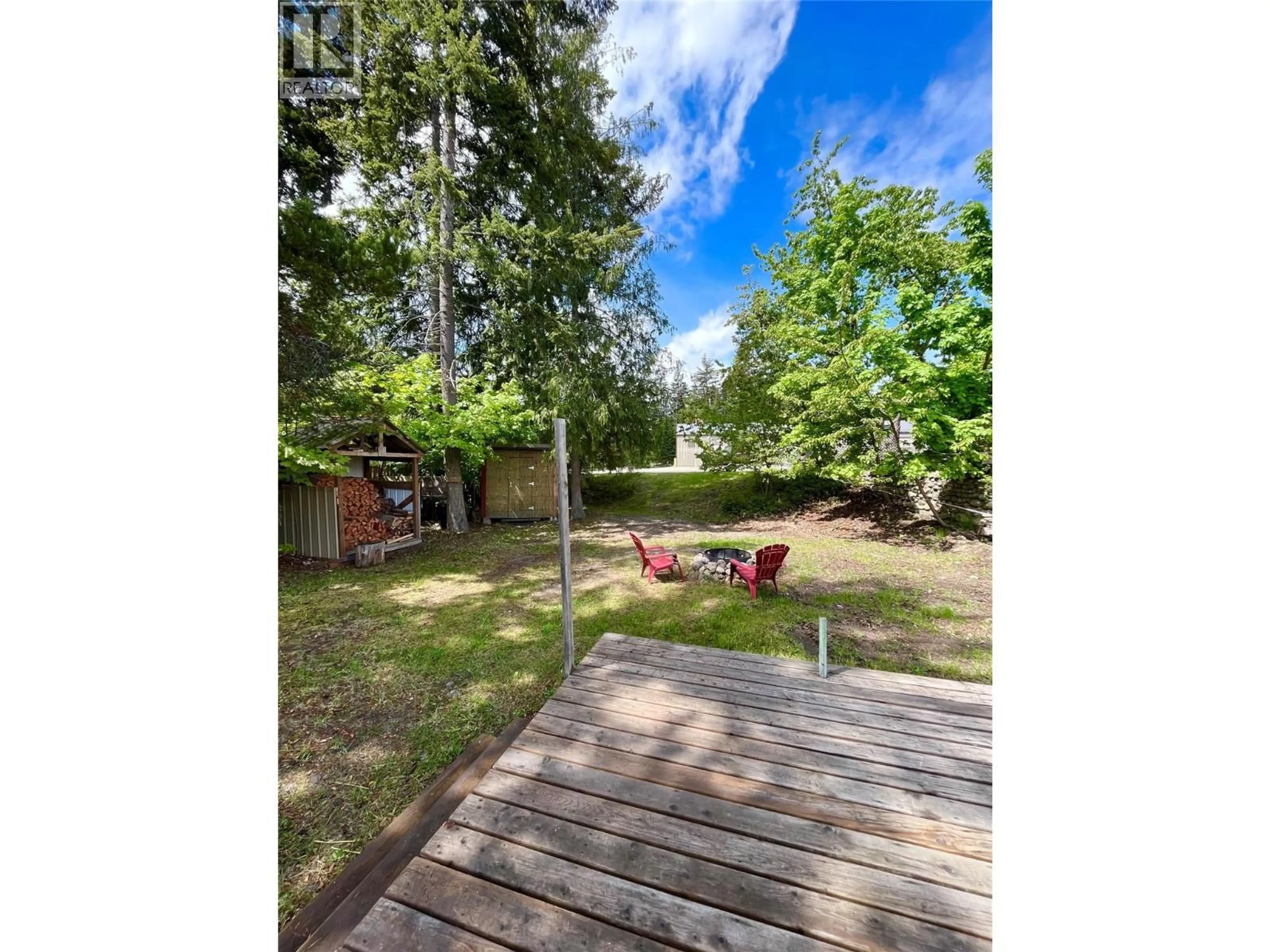 A pic from outside/outdoor area/front of a property/back of a property/a pic from drone, forest/trees view for 305 8TH AVENUE NORTHWEST, Nakusp British Columbia V0G1R0