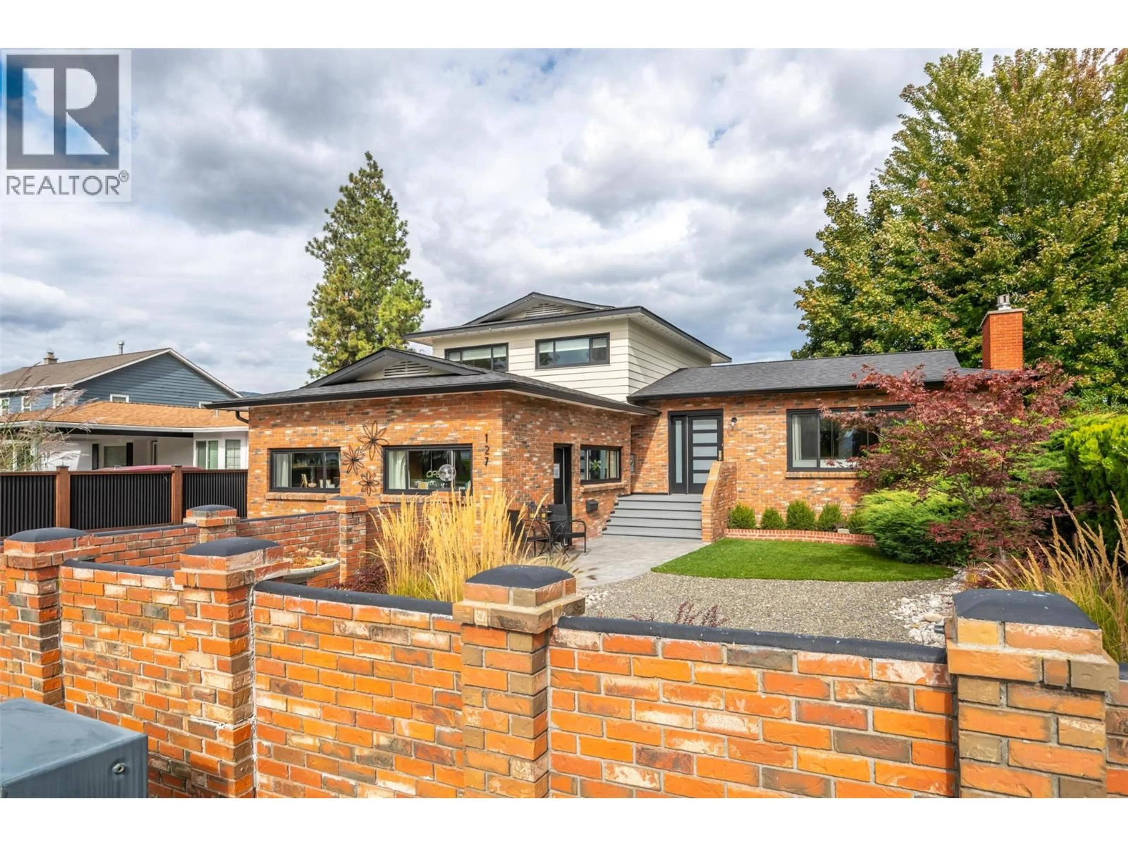 Home with brick exterior material, street for 127 ELM AVENUE, Penticton British Columbia V2A3W1