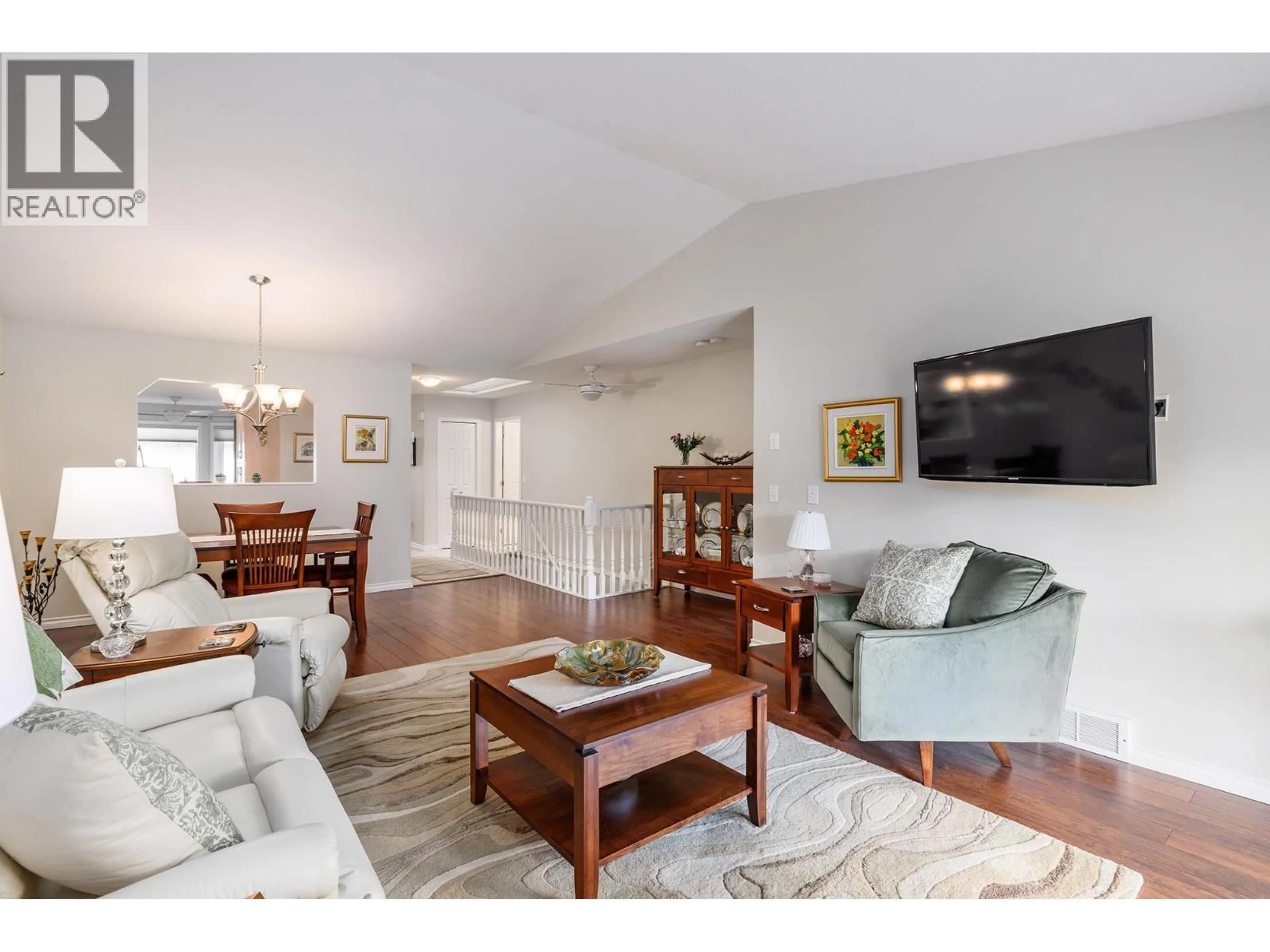 Living room with furniture, wood/laminate floor for 39 - 1874 PARKVIEW CRESCENT, Kelowna British Columbia V1X7G6