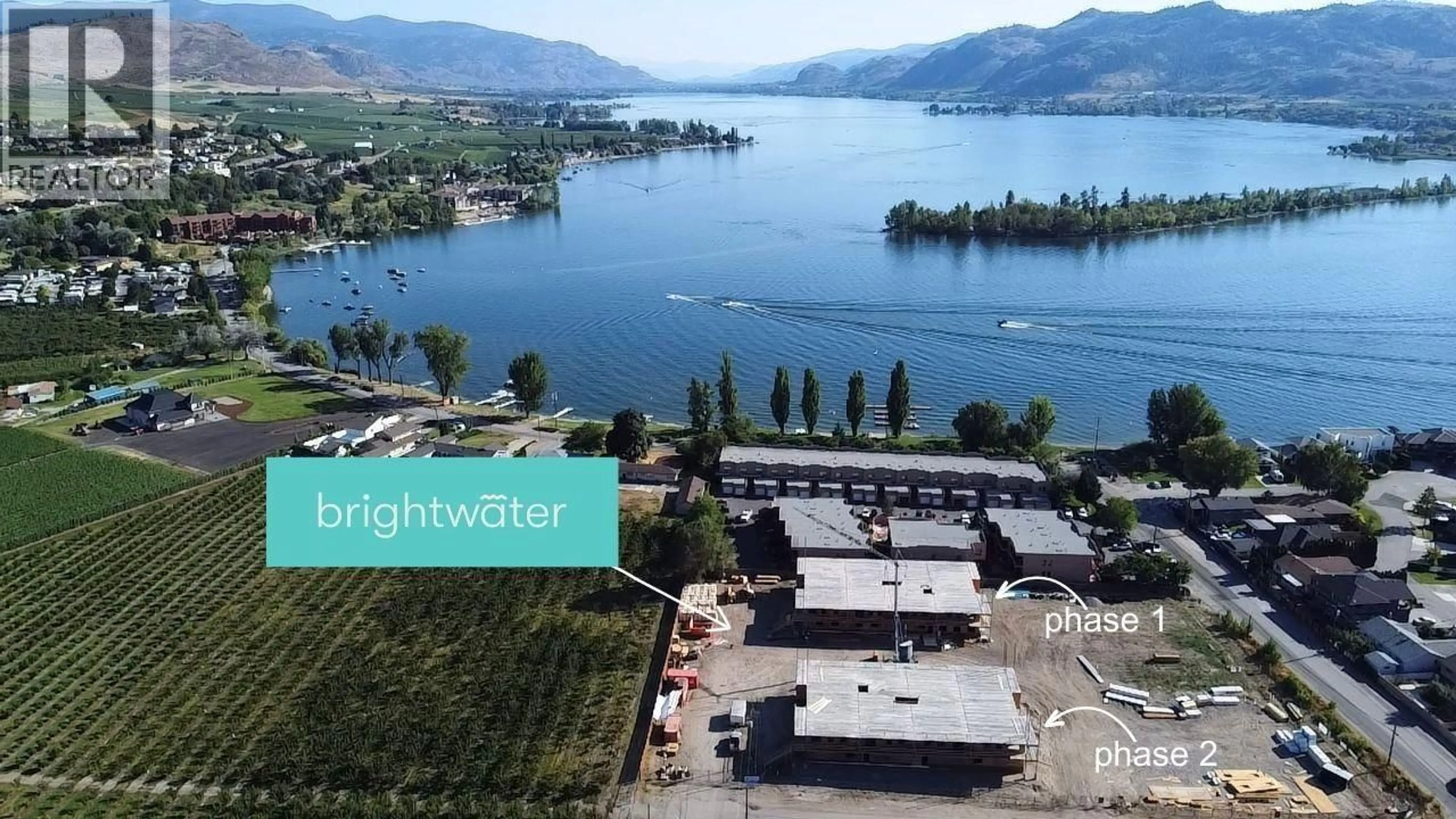A pic from outside/outdoor area/front of a property/back of a property/a pic from drone, water/lake/river/ocean view for 403 - 5620 51ST STREET, Osoyoos British Columbia V0H1V6