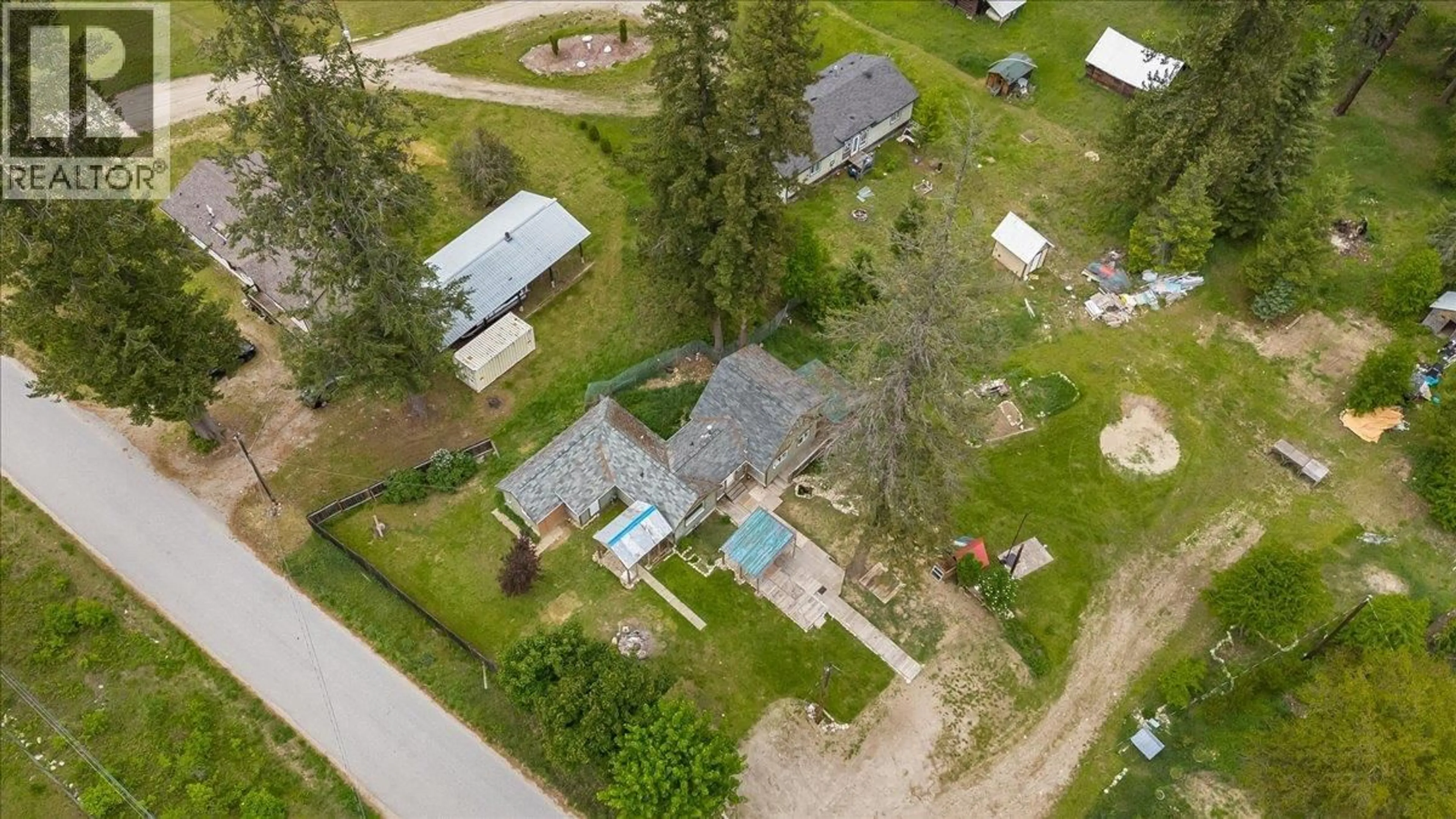 A pic from outside/outdoor area/front of a property/back of a property/a pic from drone, street for 2018 TARRYS ROAD, Castlegar British Columbia V1N4N1