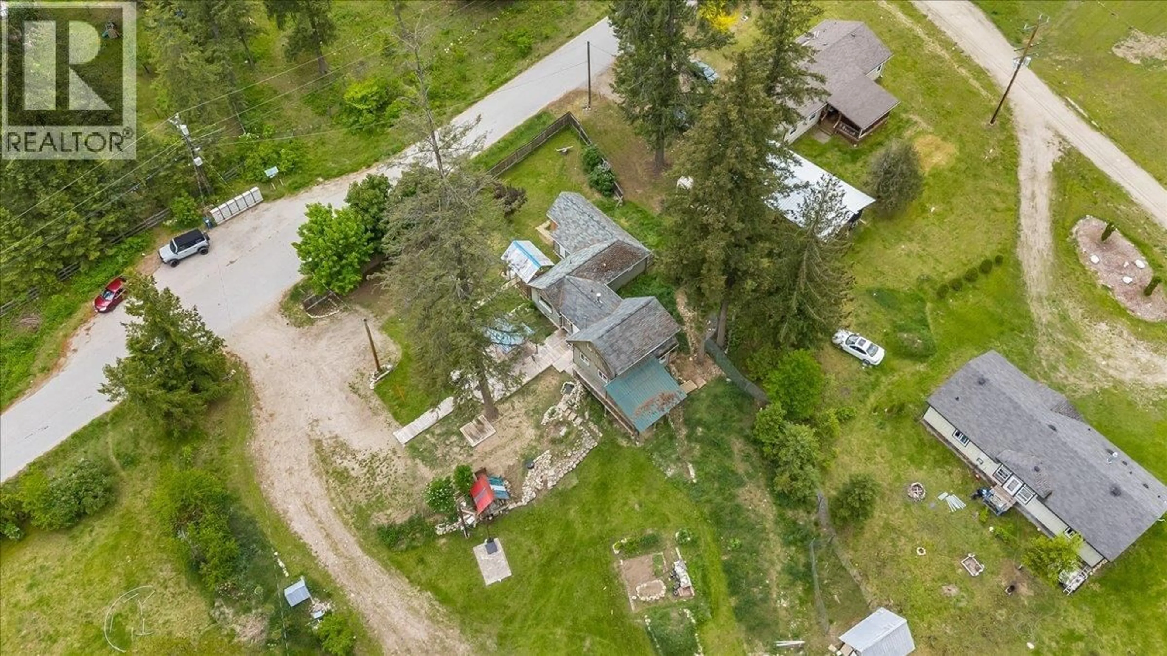 A pic from outside/outdoor area/front of a property/back of a property/a pic from drone, street for 2018 TARRYS ROAD, Castlegar British Columbia V1N4N1