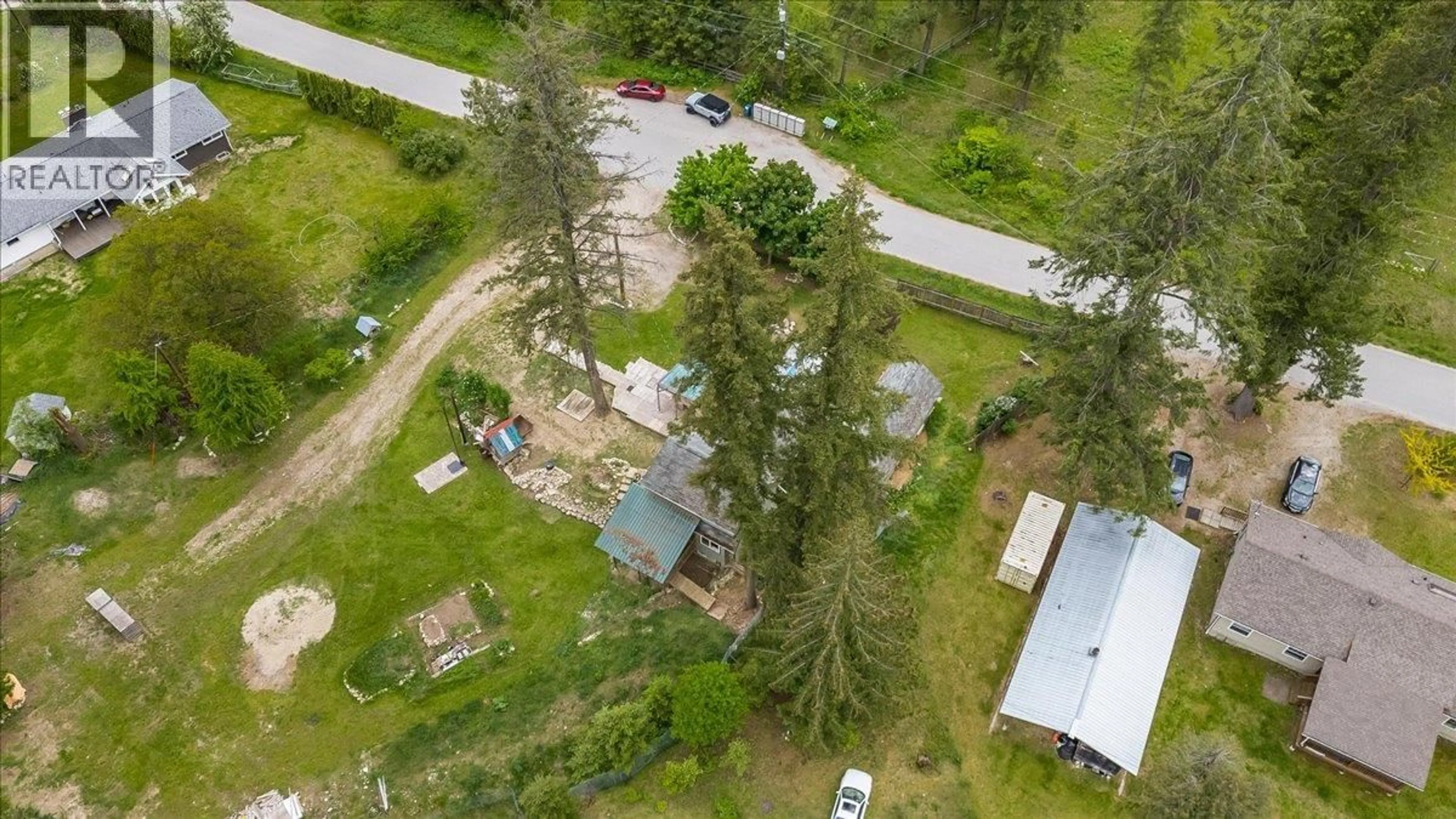 A pic from outside/outdoor area/front of a property/back of a property/a pic from drone, unknown for 2018 TARRYS ROAD, Castlegar British Columbia V1N4N1