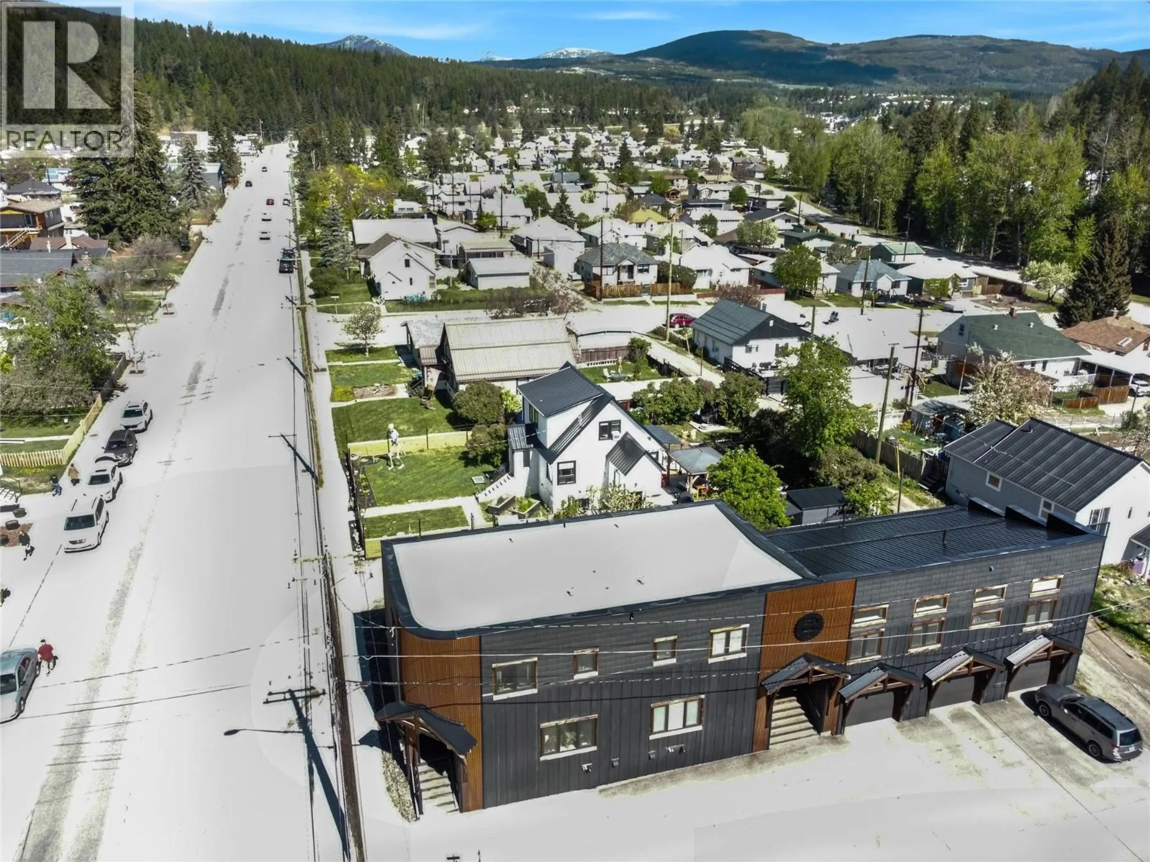 A pic from outside/outdoor area/front of a property/back of a property/a pic from drone, mountain view for 1 - 323 BANKS STREET, Kimberley British Columbia V1H1H8