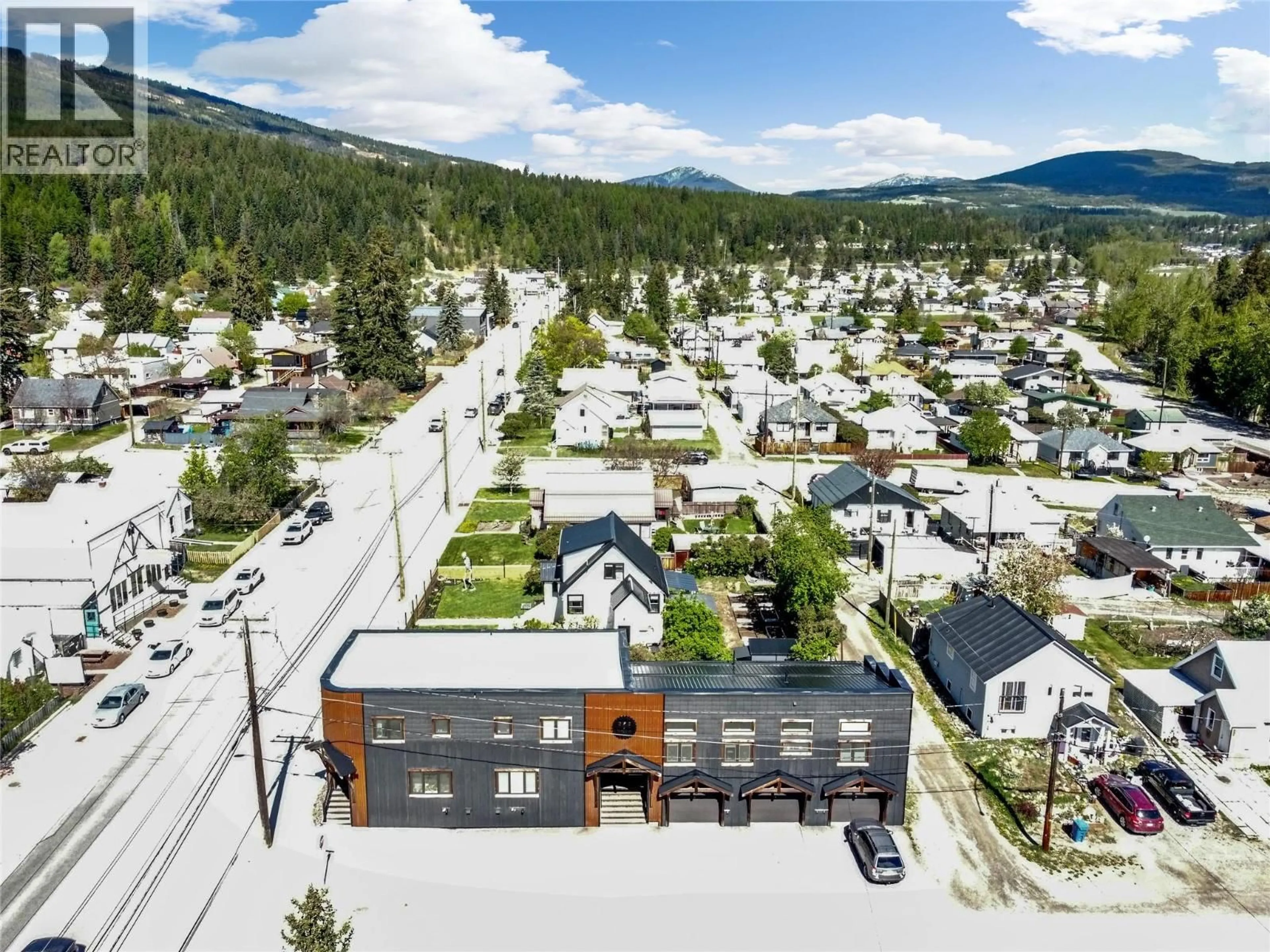 A pic from outside/outdoor area/front of a property/back of a property/a pic from drone, mountain view for 1 - 323 BANKS STREET, Kimberley British Columbia V1H1H8