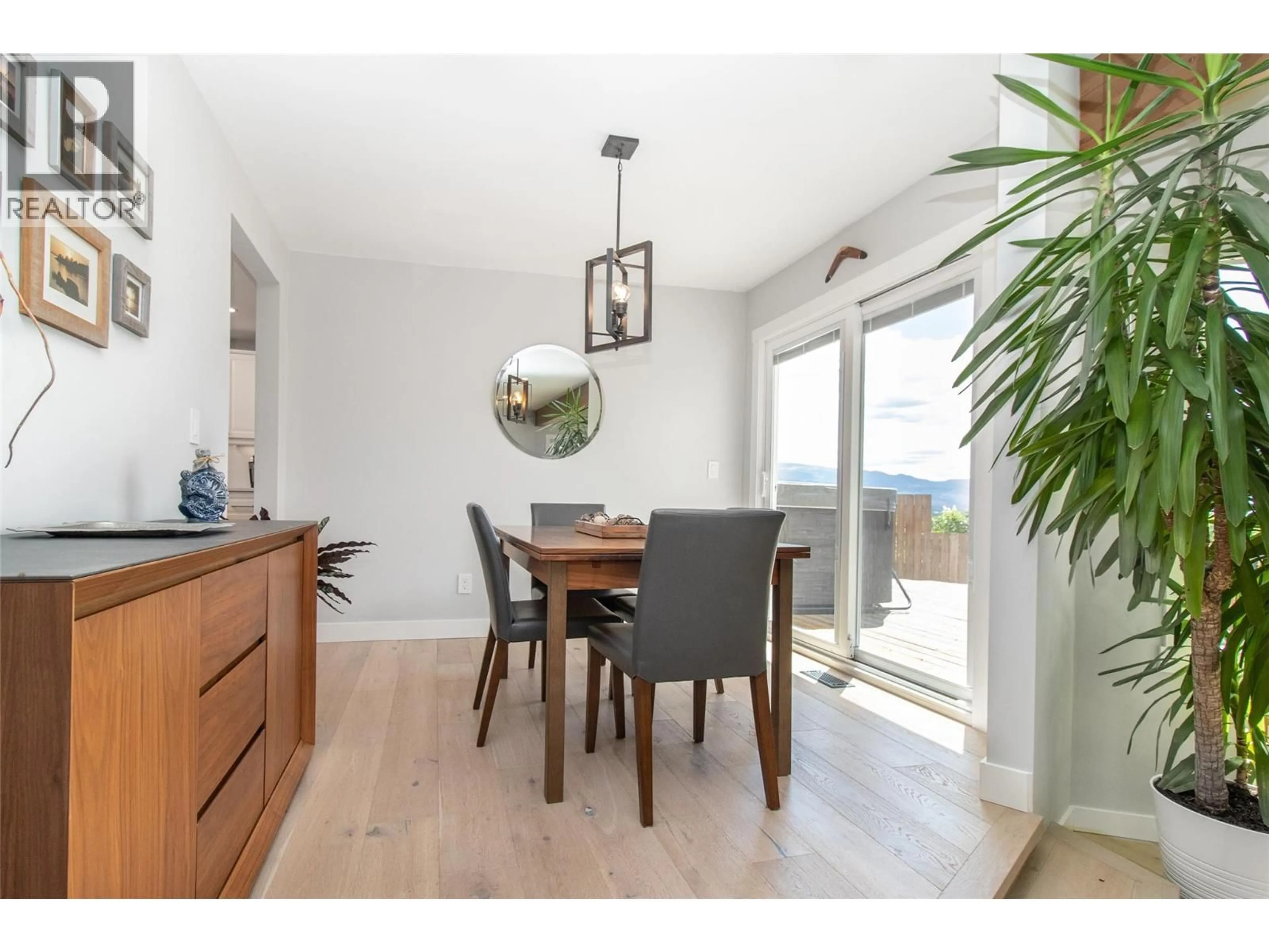 Dining room, wood/laminate floor for 1716 CATHY COURT, Kelowna British Columbia V1P1L4